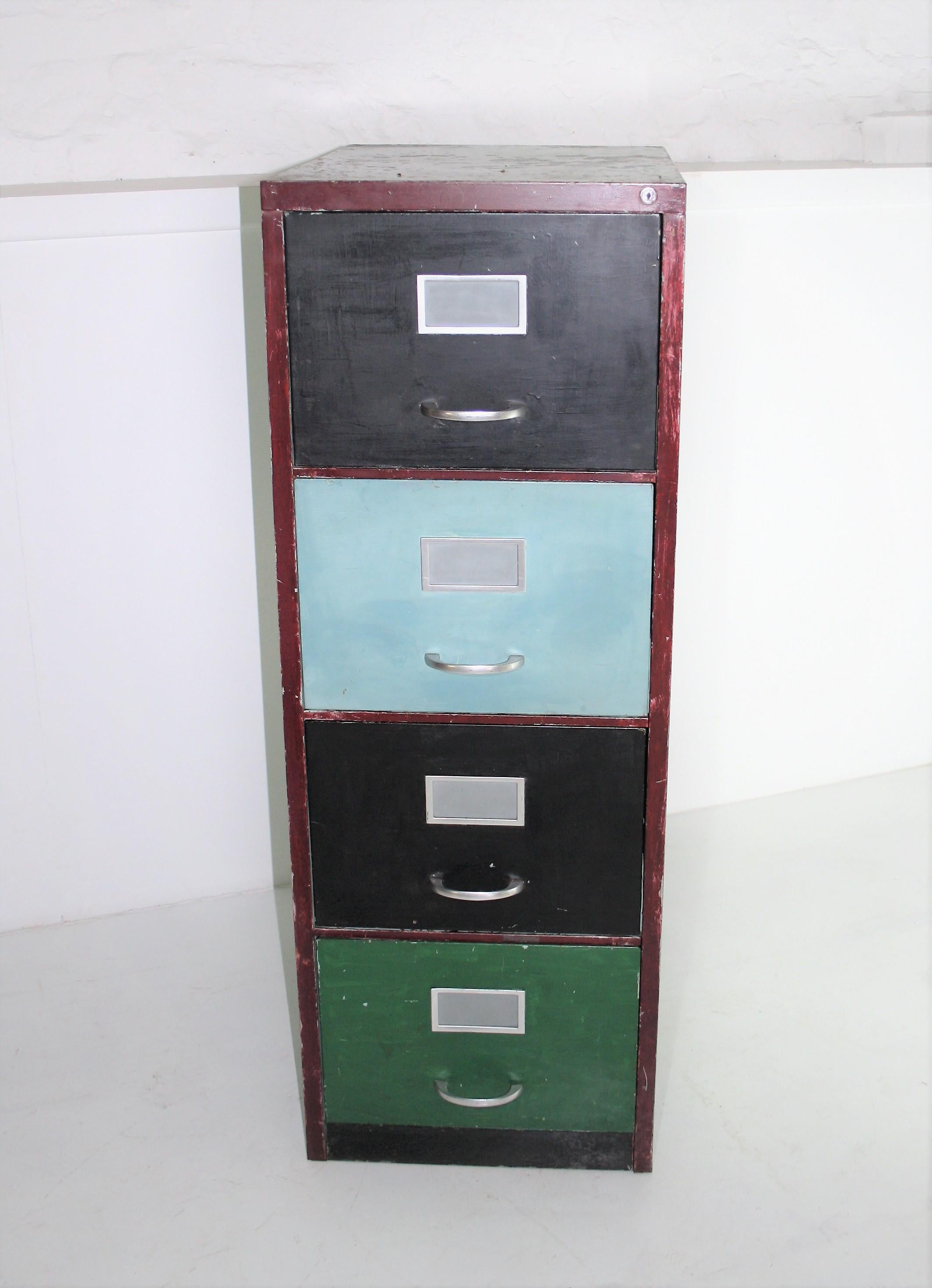 Unusual, definitely wacky and possibly artistic.
This 1970s retro filing cabinet in the most bizarre colour combination (as found).
All in good working order, the suspension rails on the top drawer are missing ( as seen in photos), all other