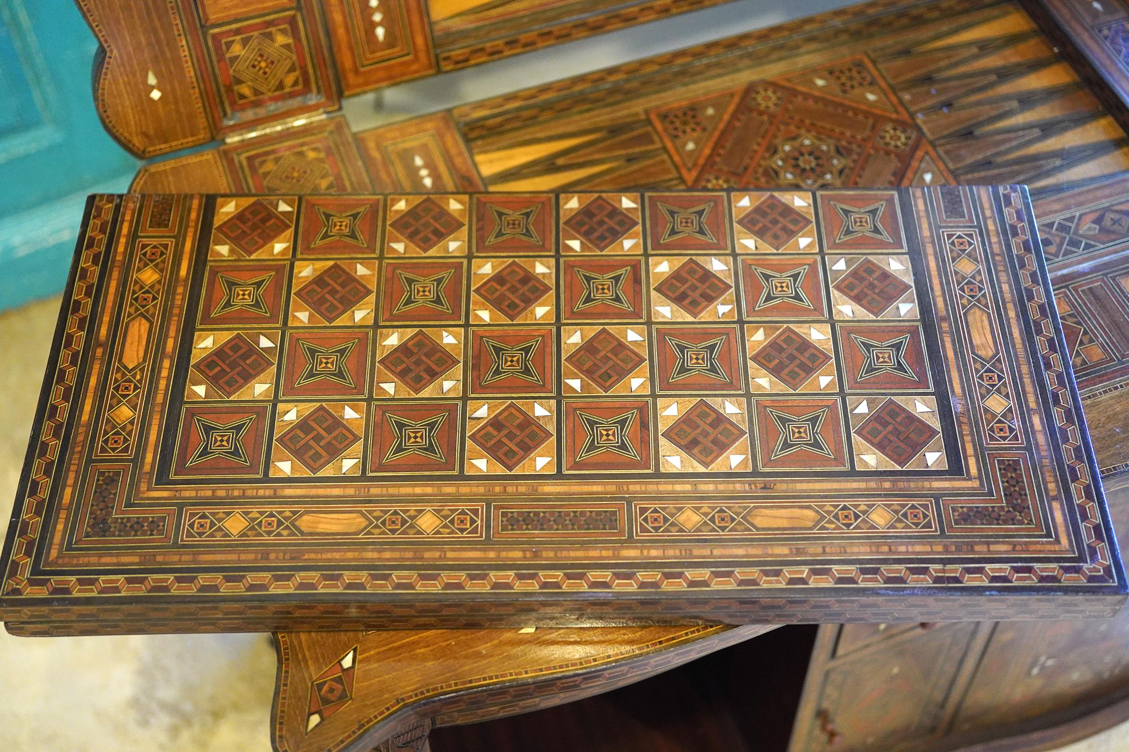 Unusual Inlaid Syrian Game Table w/ Backgammon, Chess, Card and Pullout Seat 20th C.

Used, Good condition, See All Photos For Details

Dimensions: 19 1/2 Inches Depth x 38 1/2 Inches Wide x 30 Inches Tall