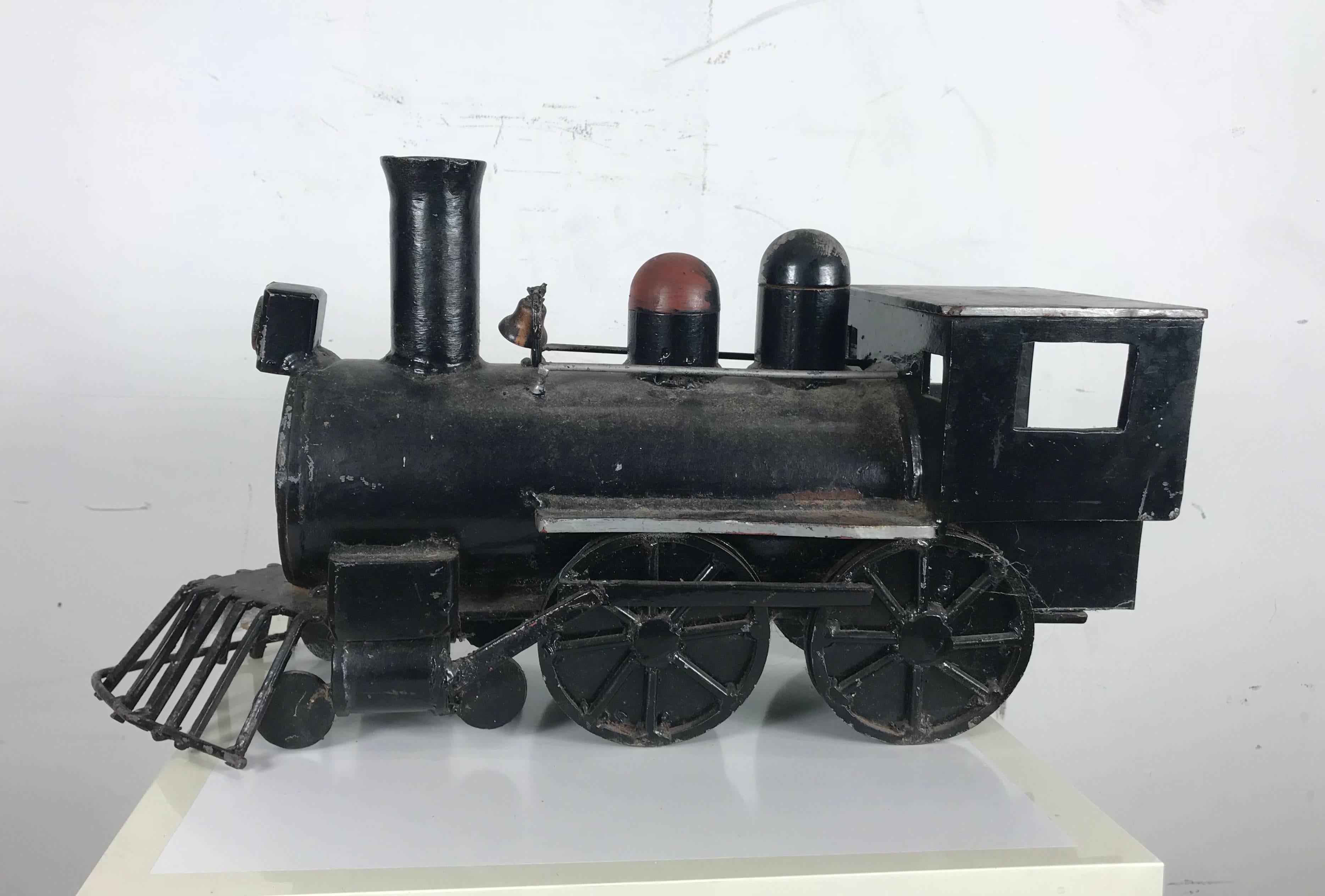 Unusual iron welded handmade folk art locomotive, train, very well executed. Artist /maker unknown.