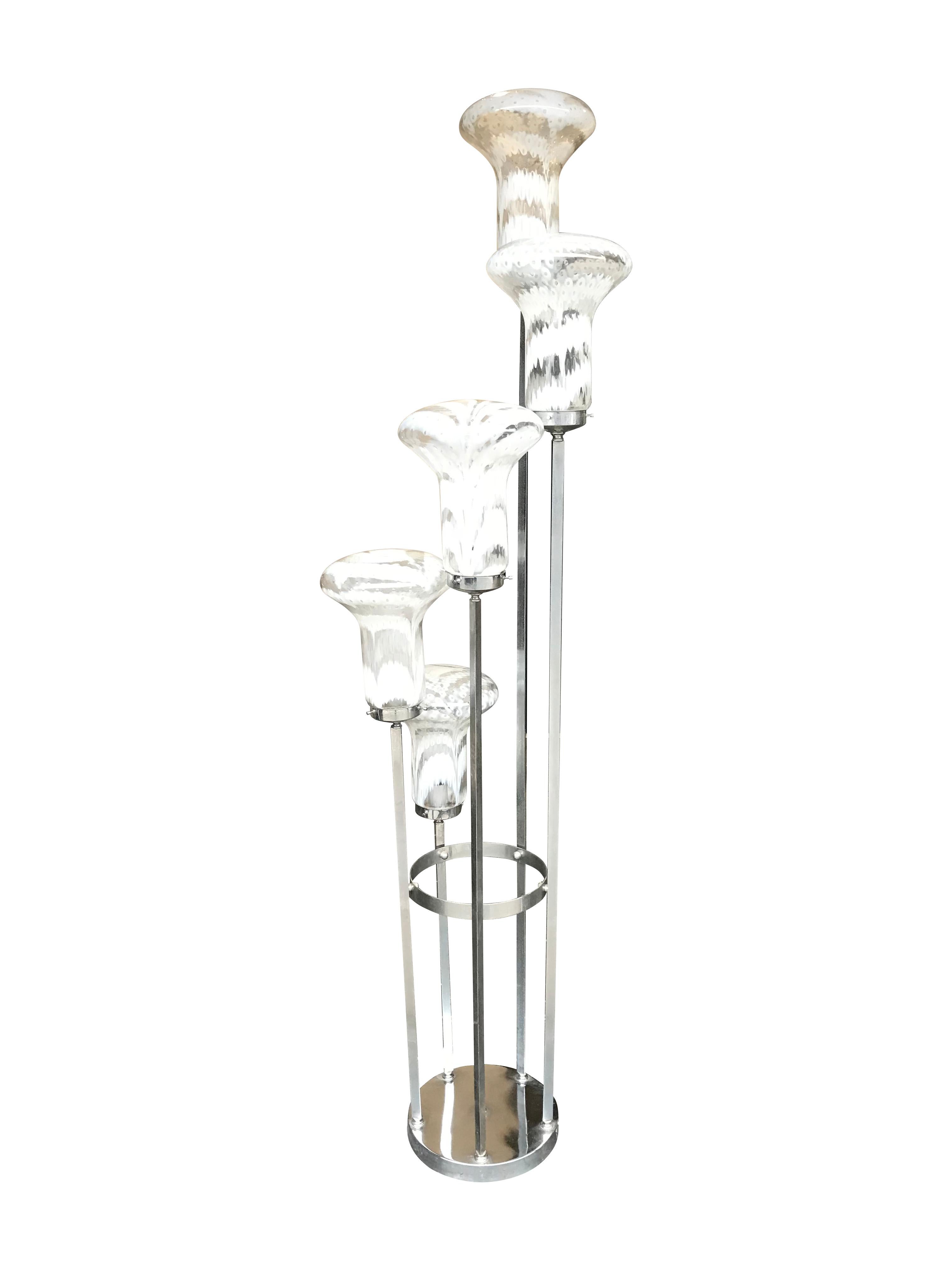 An unusual Italian floor lamp with five large white and clear swirling patterned Murano glass shades. All fixed on a circular chrome base. Re wired with antique silver cord flex, foot switch and PAT tested.