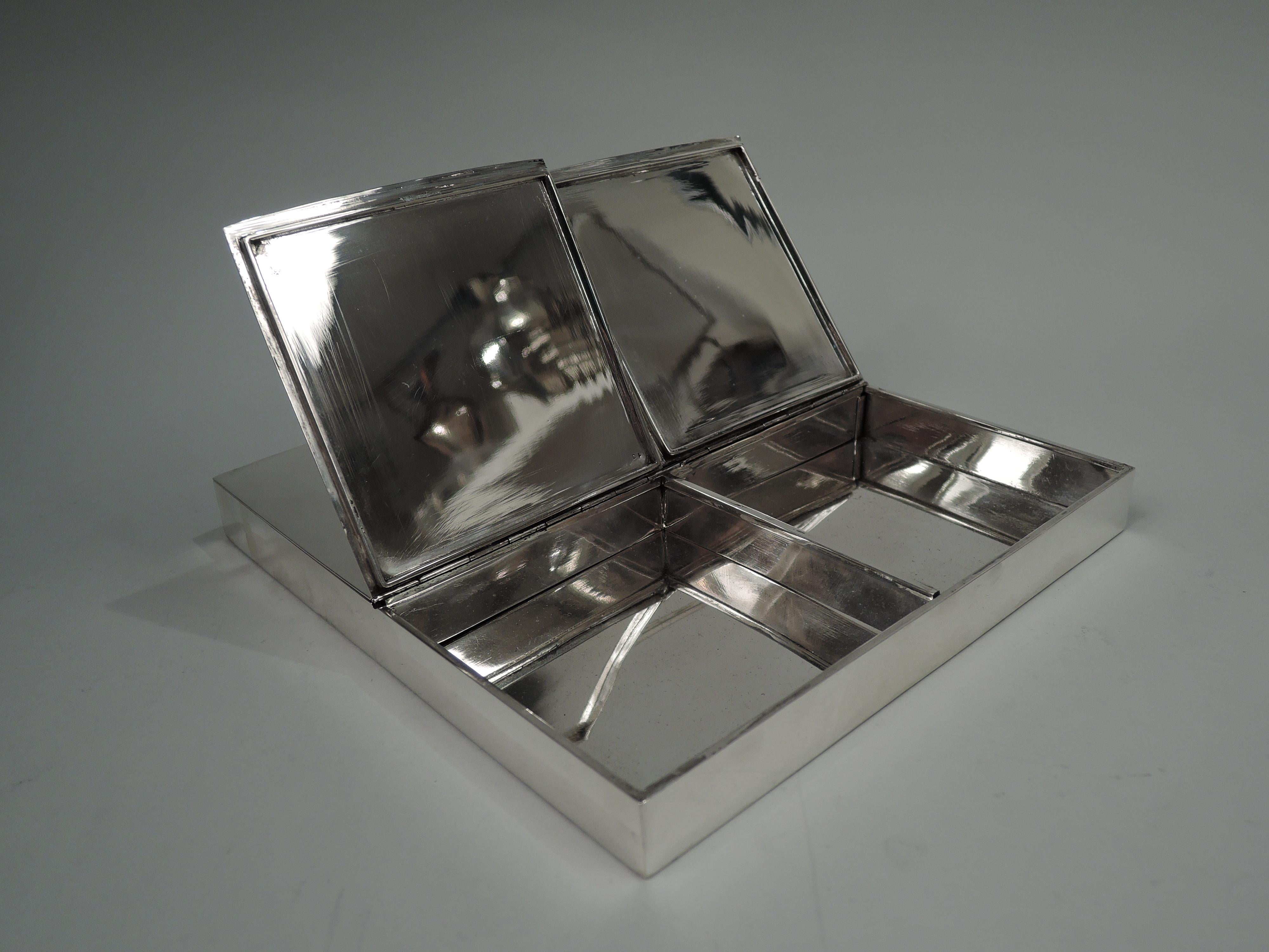 Unusual Italian Modern sterling silver box, ca 1940. Straight sides partitioned with four square compartments, each with hinged cover. Marked. Heavy weight: 30.5 troy ounces. 