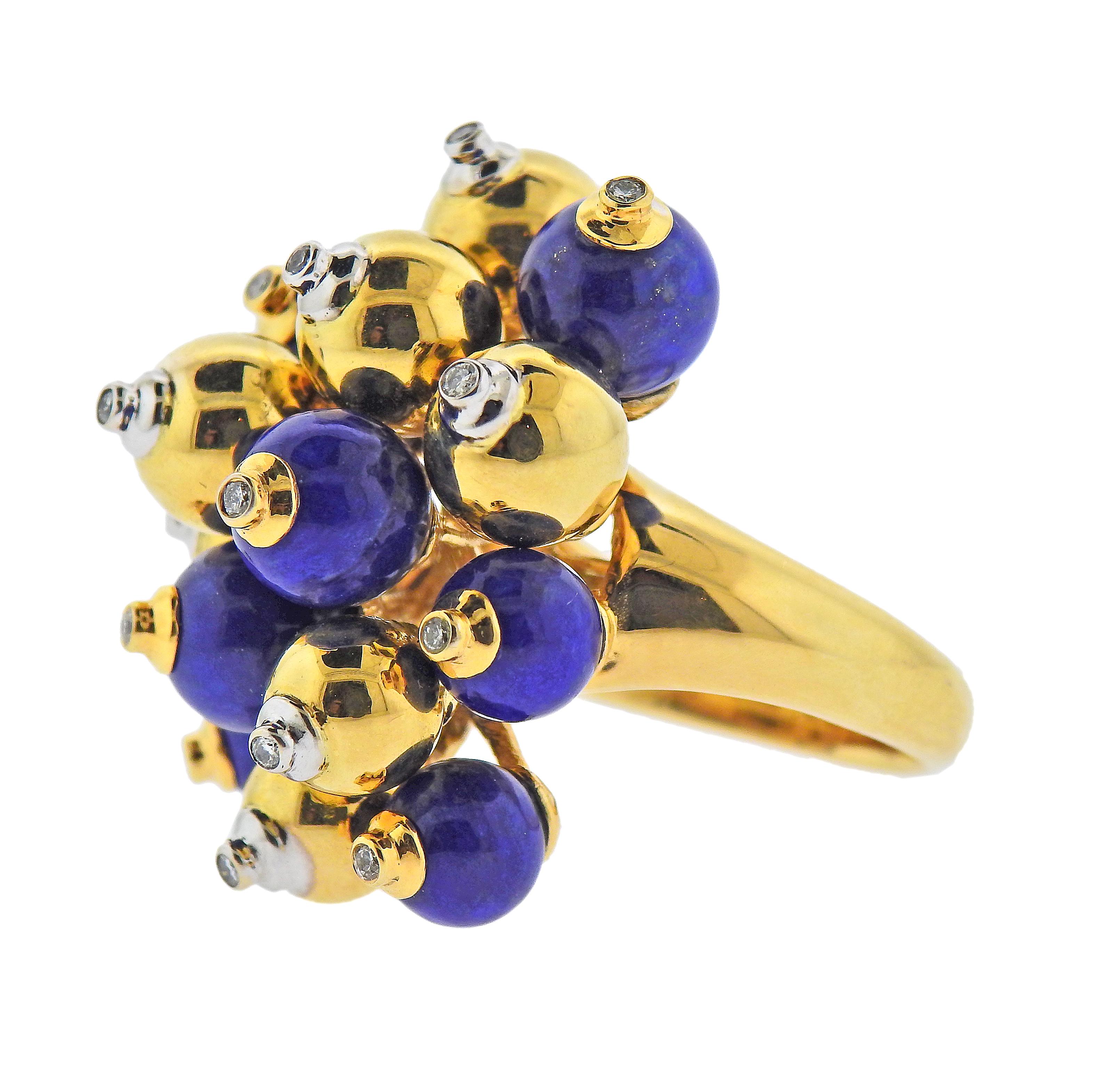 18k yellow gold cocktail ring, with 7.5mm lapis lazuli and gold balls, each set with a diamond in the center, total approx. 0.14ctw. Ring size - 7, ring top - 32mm x 25mm. Marked: 750. Weight - 22 grams. 