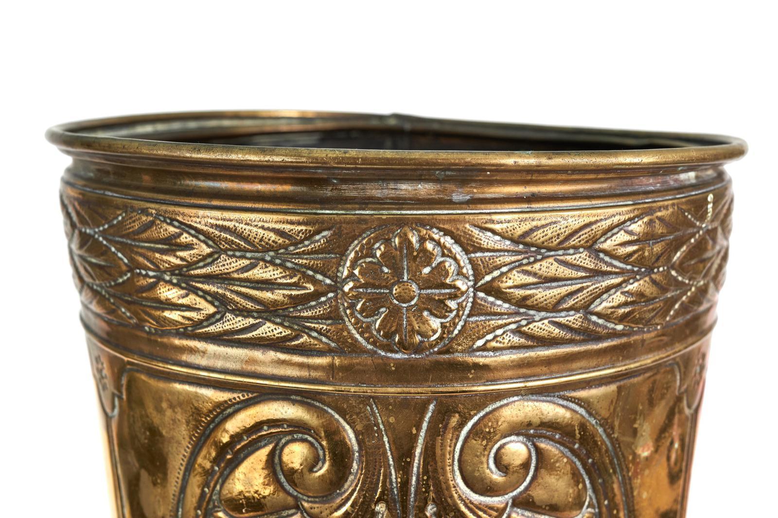 Unusual Large Antique Brass Stick Or Umbrella Stand, circular in shape and decorated with shells, flowers and leaves.