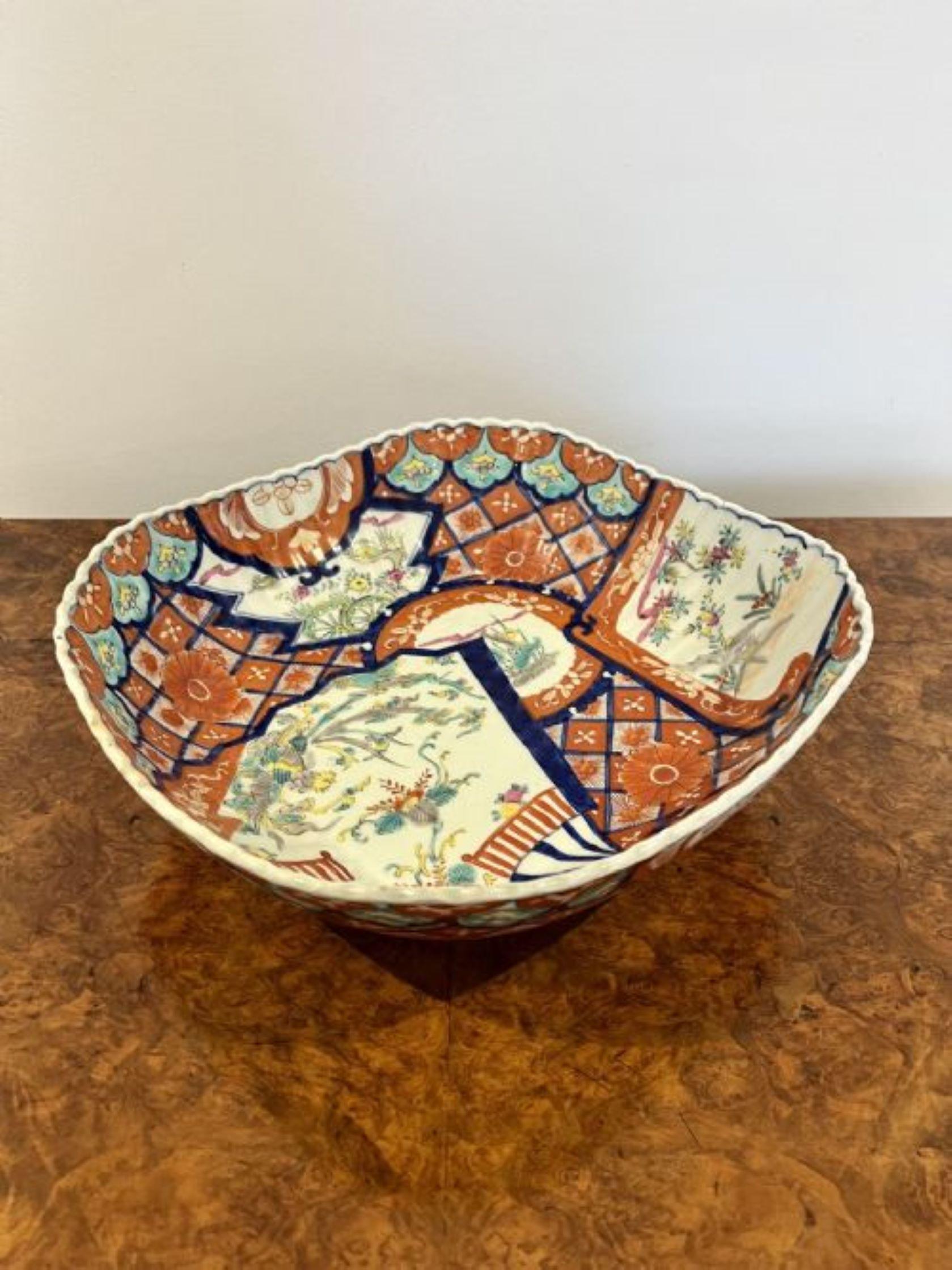 Unusual large antique Japanese quality Imari bowl having a quality hand painted Imari bowl with wonderful fan decoration in fantastic red, green, white, blue and yellow colours