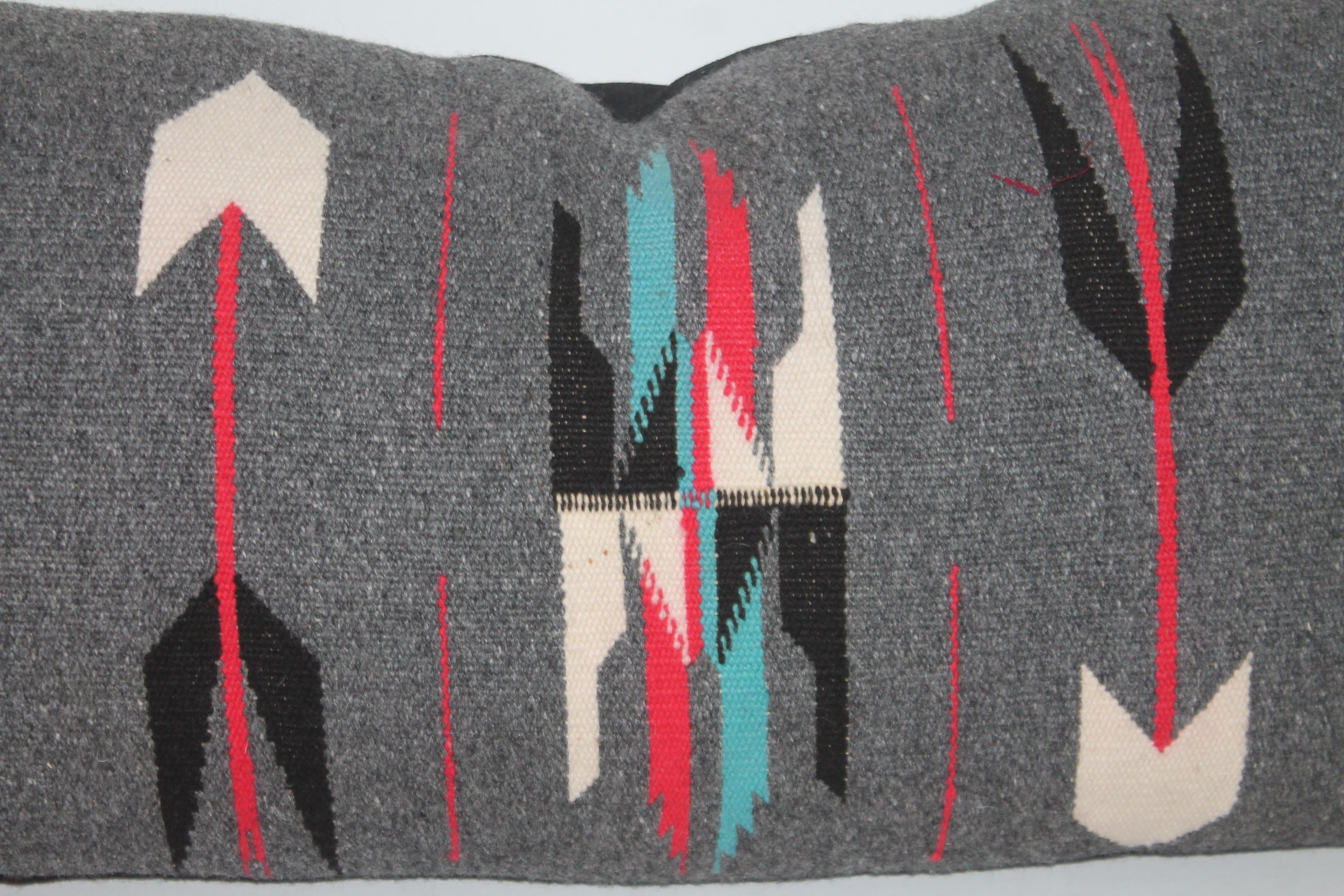 Gorgeous gray background with vibrant lines and design that flows throughout the pillow in a stunning pattern.