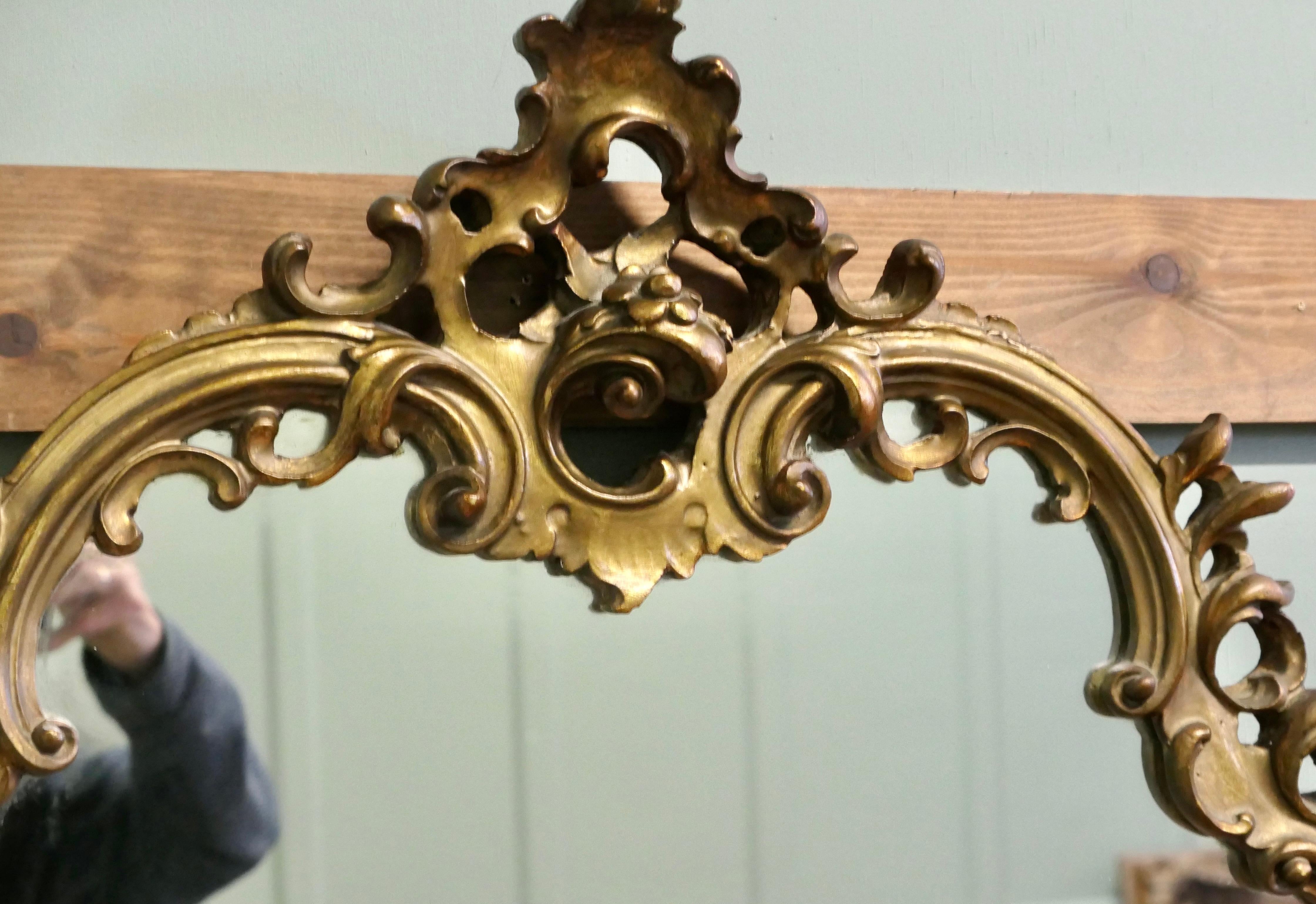 Unusual Large Rococo Style Gilt Wall Mirror  The Mirror has an elaborate shape In Good Condition For Sale In Godshill, Isle of Wight