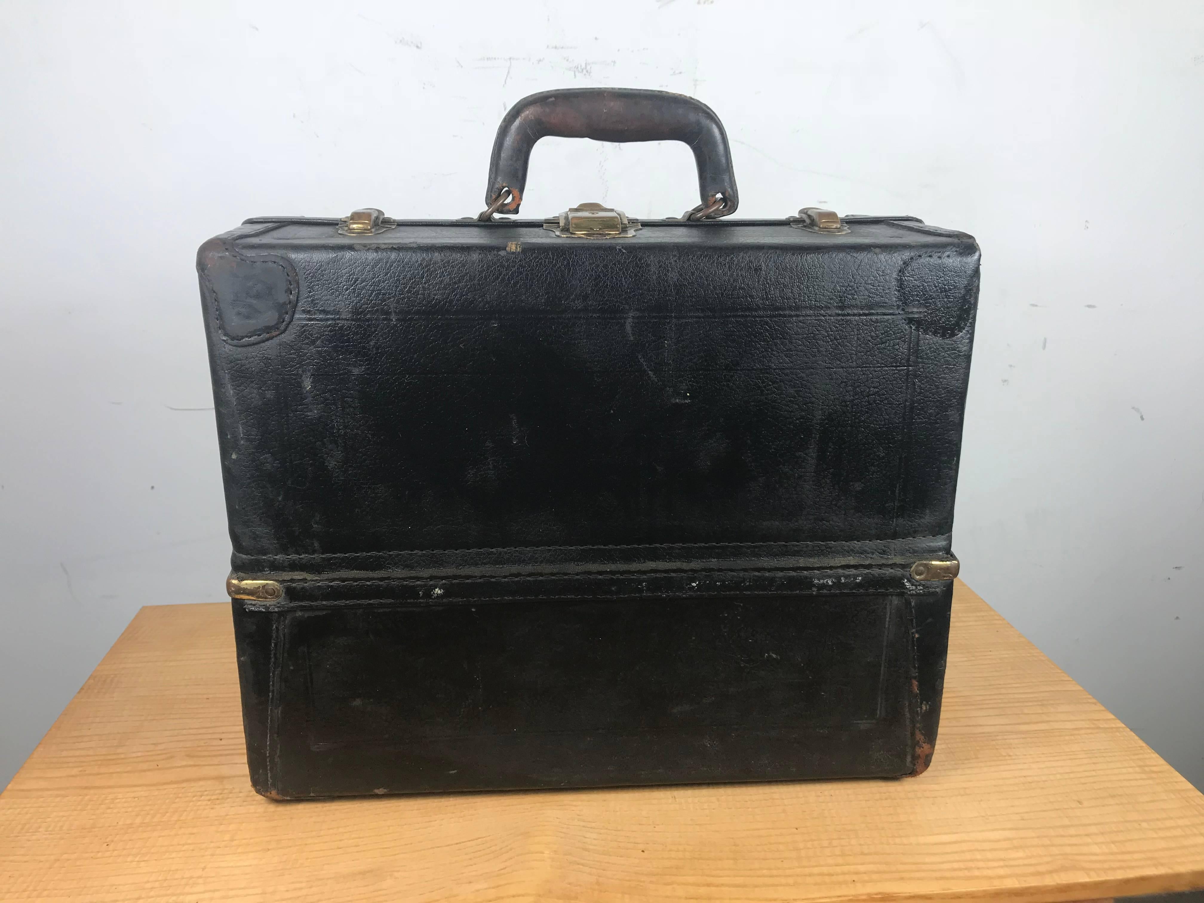 Unusual leather expanding multi tray jewelers case made by Knickerbocker Case Co, Chicago. Ingenious design.