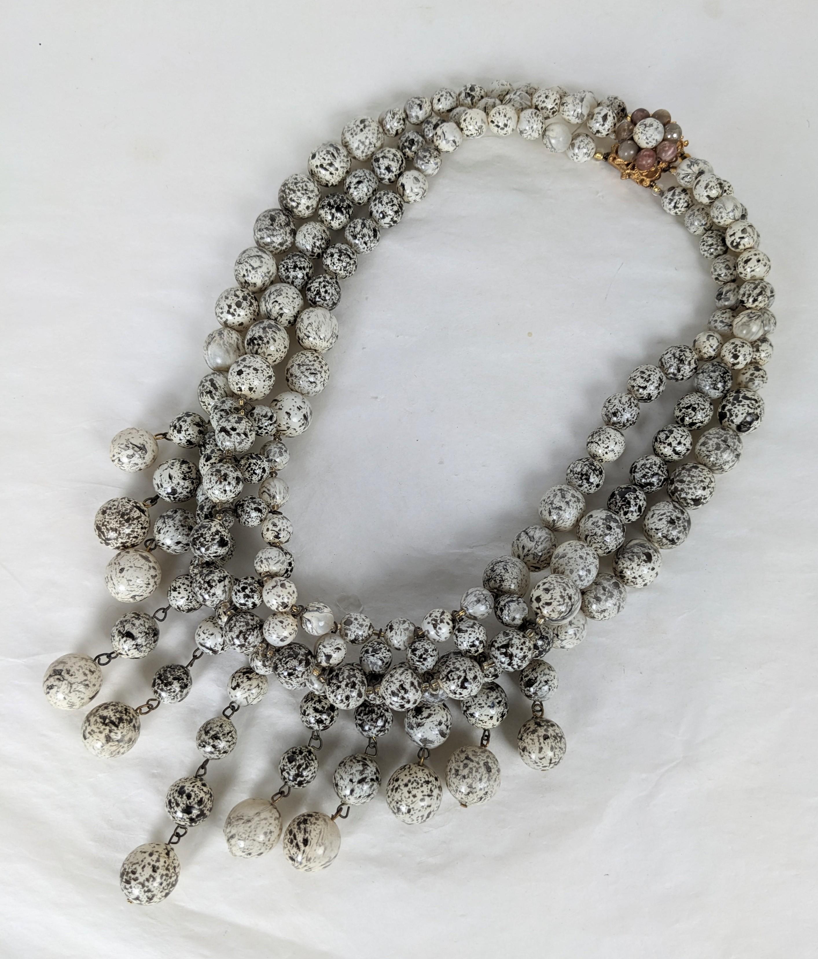 Unusual Louis Rousselet Pate de Verre Splatter Paint Bead Bib from the 1950's. Pate de verre hand made glass beads with black splatter pattern on ivory colored glass. Multiple strands with graduated drops with signature clasp. Unsigned. France