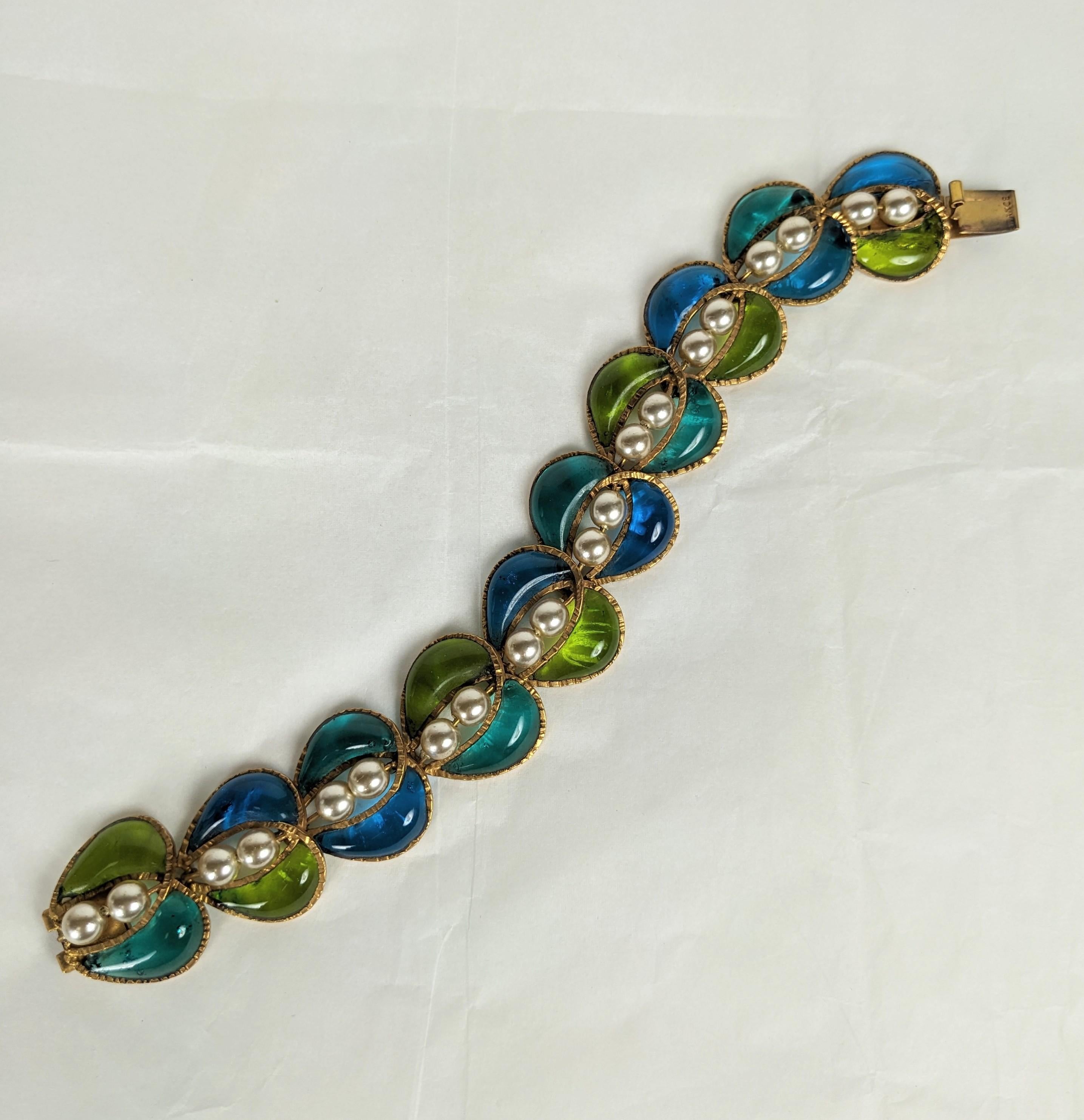 Super Unusual Maison Gripoix Leaf and Faux Pearl Bracelet from the 1950's. Handmade leaf shaped links in different tones of greens and teal with hand wired faux pearls. 1950s France. 
