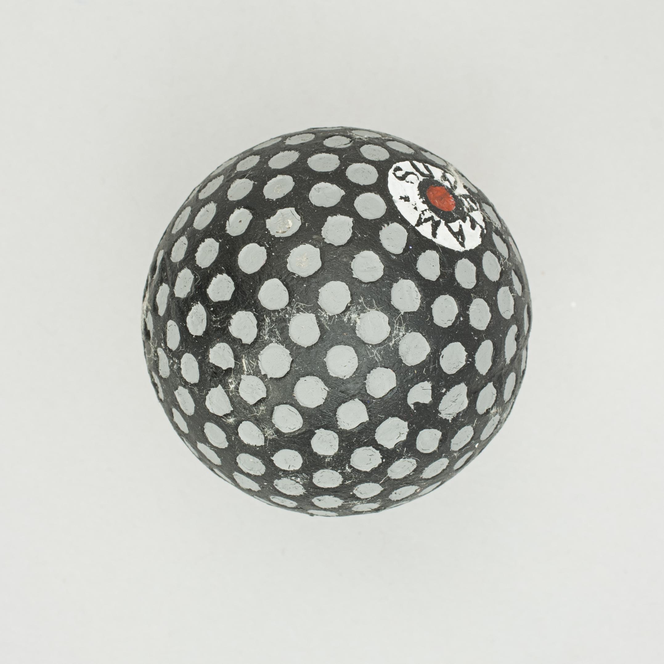 'Sunbeam' Dimple Golf Ball.
A good example of an early dimple patterned rubber core golf ball. The golf ball is in good condition and is manufactured by Capon Heaton & Co., Ltd., Birmingham, England. The ball is marked 'Sunbeam' on both poles and is