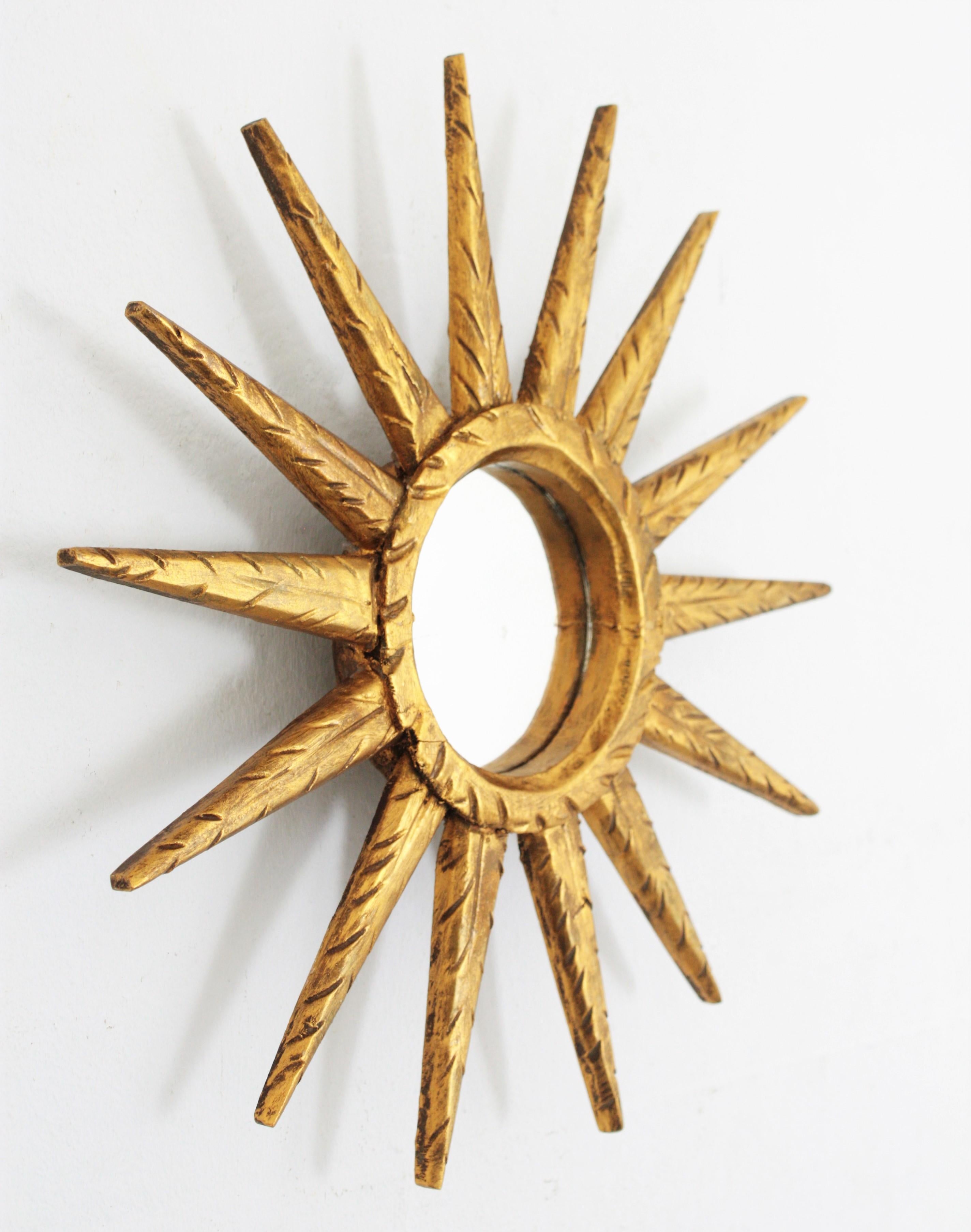 Mid-Century Modern Unusual Mini Sized Carved Giltwood Sunburst or Starburst Mirror, Spain, 1960s