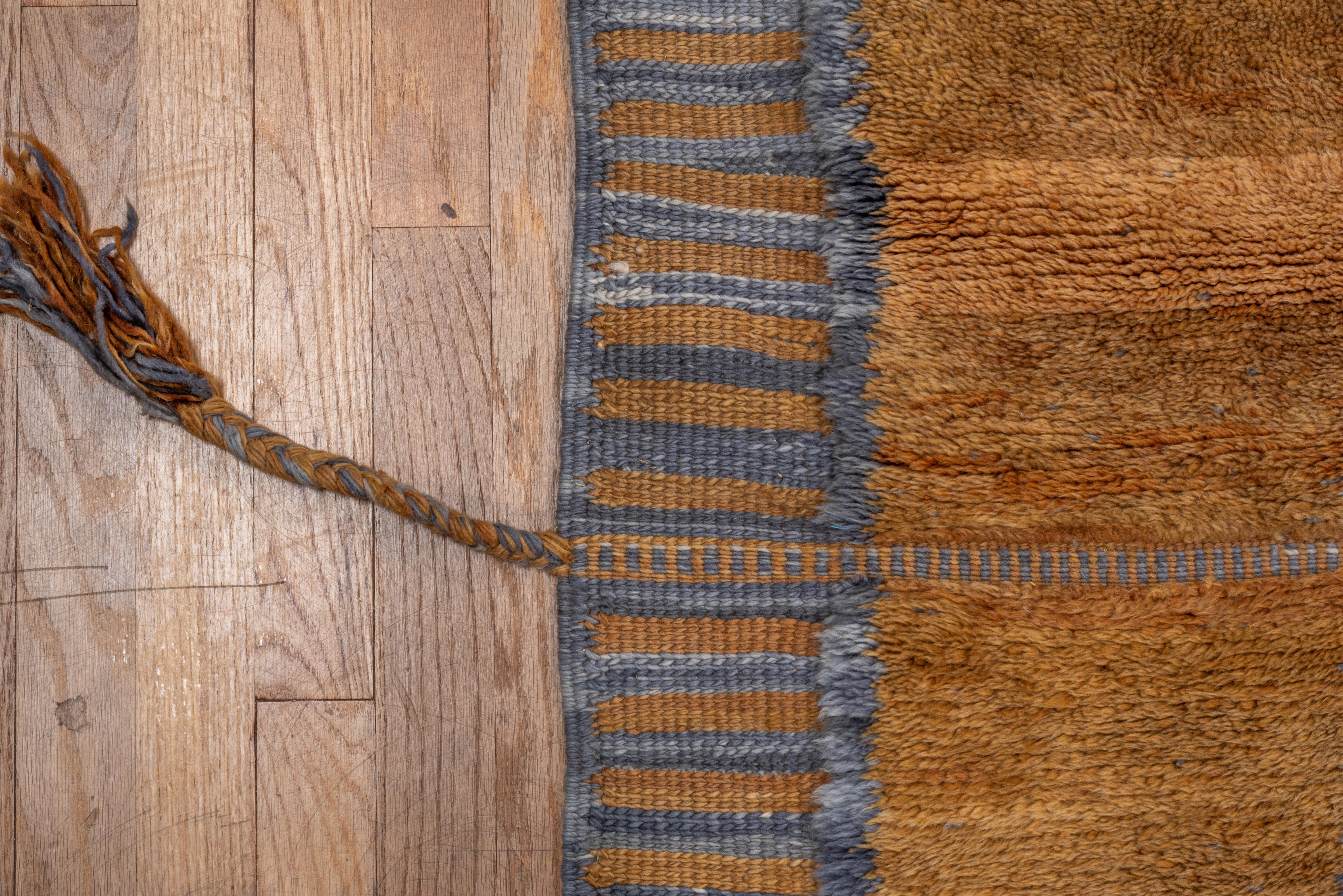 Wool Unusual Modern Gray Moroccan Rug, Copper Tones and Thick Side Tassels For Sale