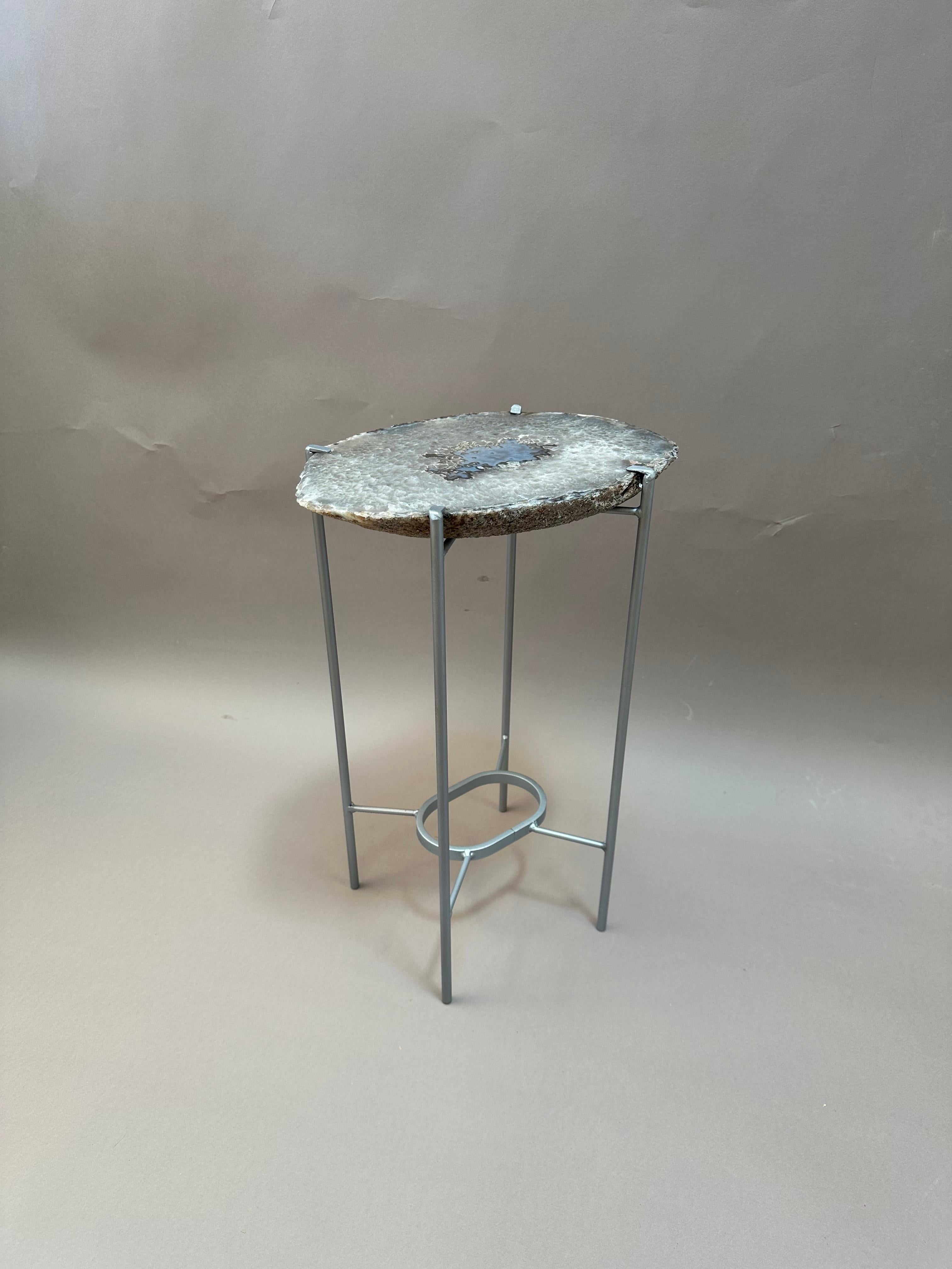 Unusual Modern Handcrafted Geode Drinks Table.Very Large quartzite top with Silver gilt steel base. Silver crystal with a purple blue center. 