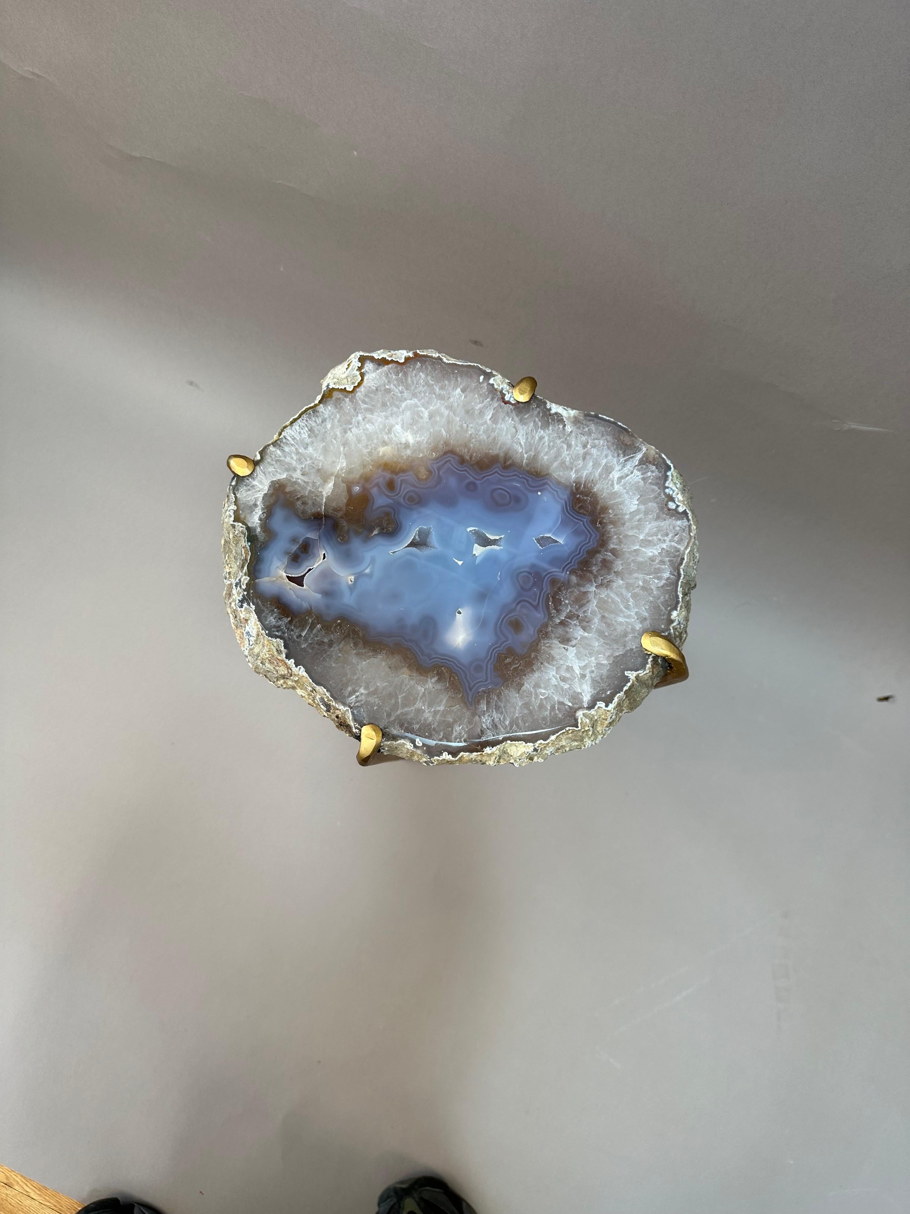 Unusual Modern Handcrafted Geode Drinks Table. Large quartzite top with gilt steel base. Silver crystal with an extremely vibrant amber and blue center. 