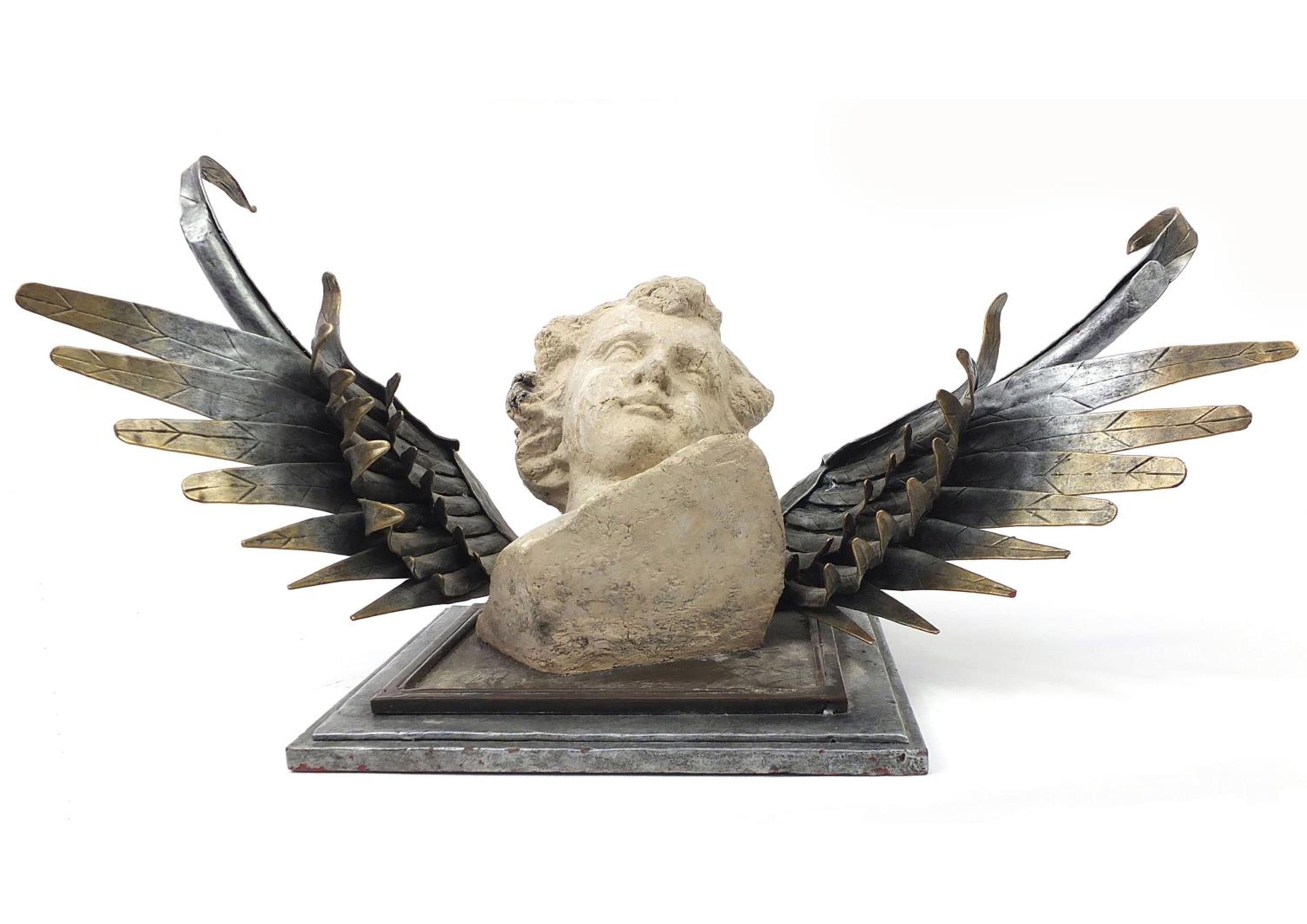 Unknown Unusual Neoclassical Style Wall Mounted Stone Cherub / Angel with Silver Wings For Sale
