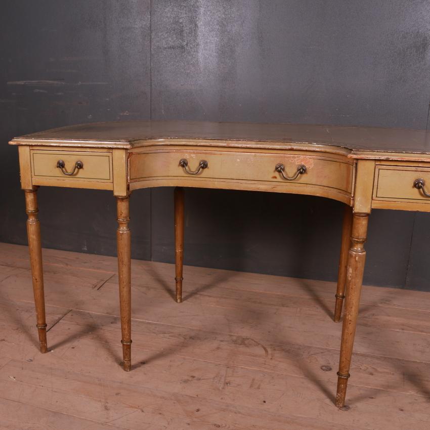 Unusual 19th century painted desk with a curved back, 1860.

Dimensions:
56 inches (142 cms) wide
27.5 inches (70 cms) deep
30.5 inches (77 cms) high.

Opening width 23