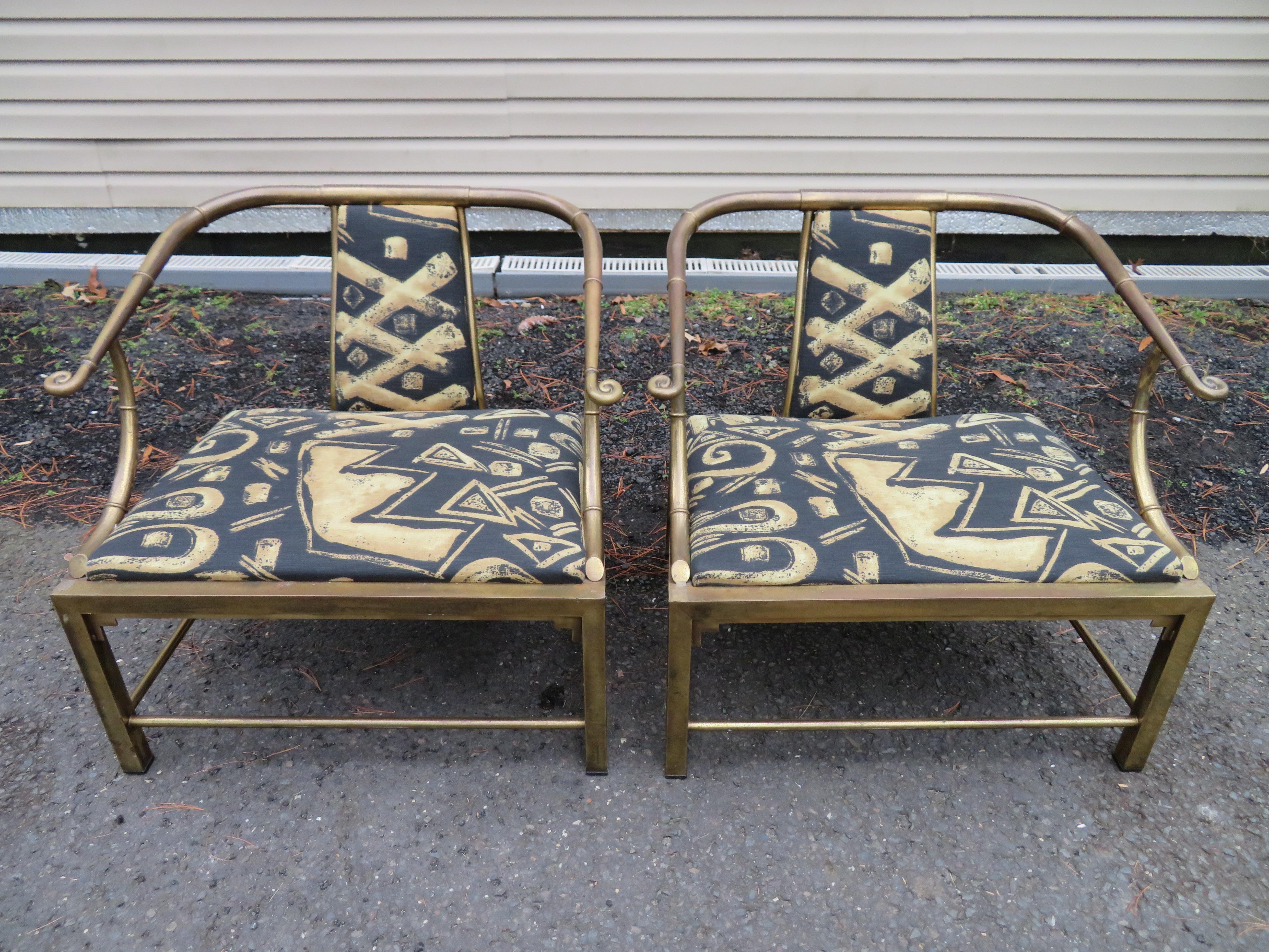 Fabulous pair of Mastercraft brass Asian style horseshoe back lounge chairs. These pair are quite unusual and different from all the other Mastercraft Asian style lounge chairs on 1stdibs or anywhere really. They seem to be a bit heavier and have a