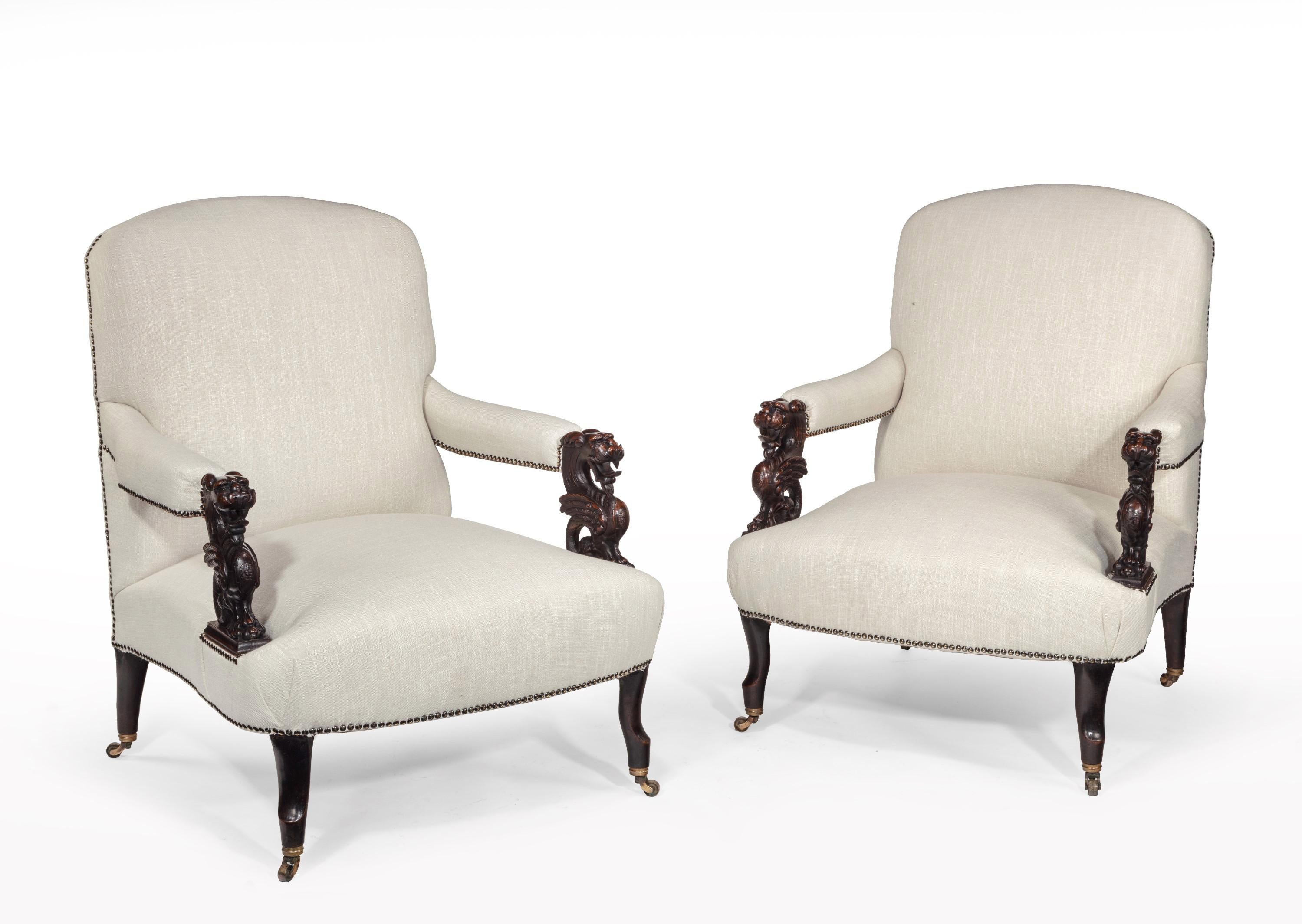 A good quality pair of French 19th century dragons head open armchairs in linen.

French, circa 1880.

An unusual pair of very comfortable open armchairs being softly sprung to the seats and back. 
Of wide proportions the domed back raised over