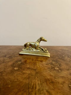 Unusual pair of antique Edwardian brass greyhound fire dogs