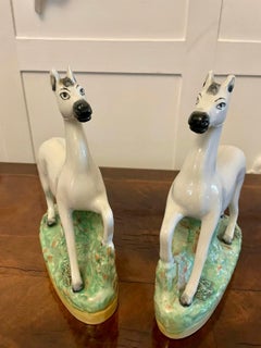 Unusual Pair of Antique Victorian Staffordshire White Horses