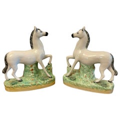 Unusual Pair of Antique Victorian Staffordshire White Horses