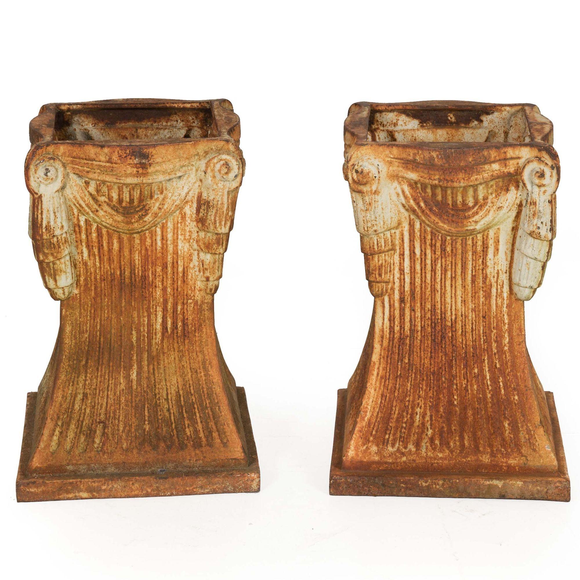 PAIR OF ART DECO CAST-IRON OUTDOOR GARDEN PEDESTALS FOR URNS OR STATUARY
Circa second quarter of 20th century  unmarked
Item # 209LEM16K-2

A most unusual and visually striking pair of cast-iron outdoor garden pedestals for raising planters, urns or