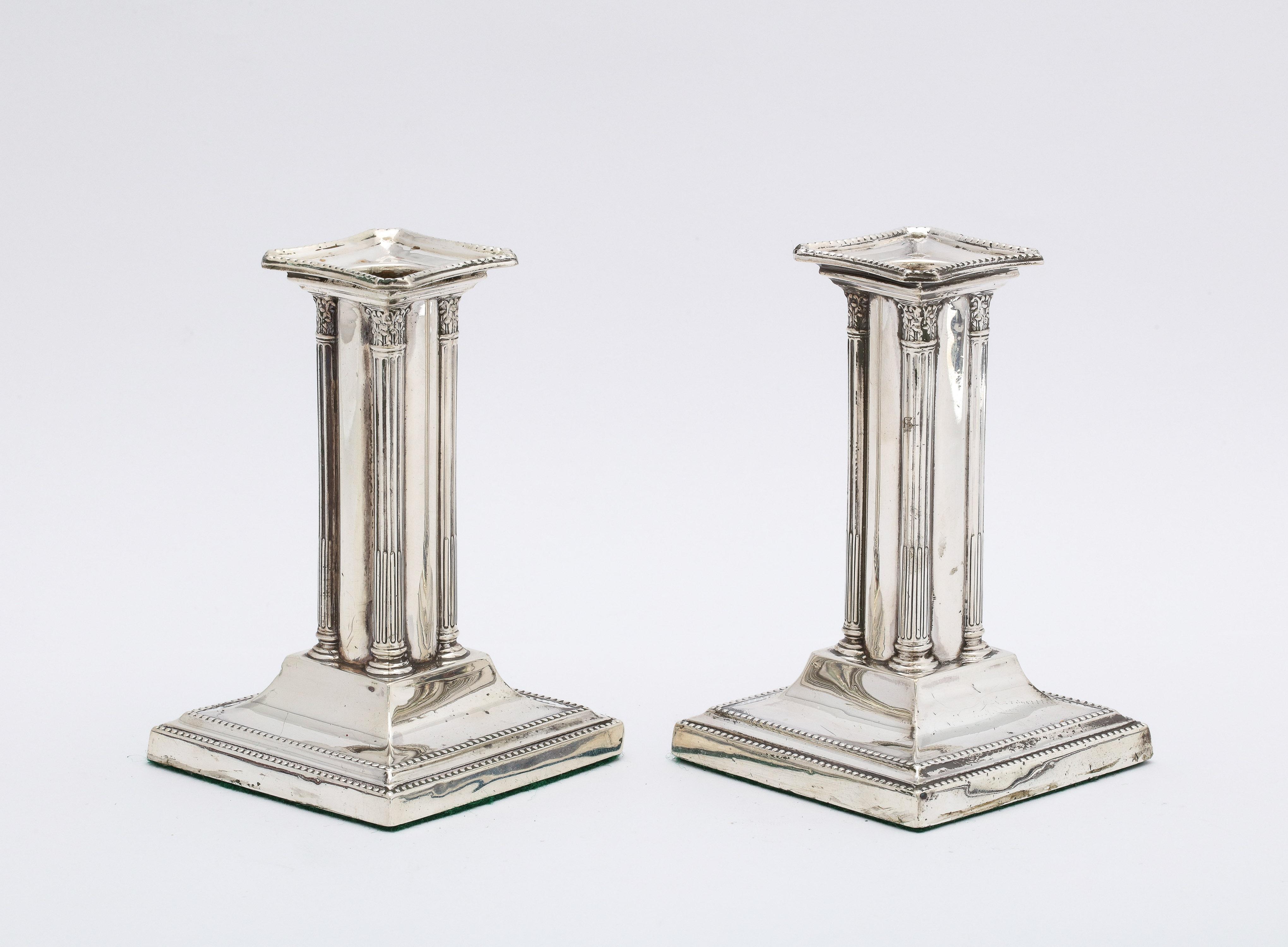 Early 20th Century Unusual Pair of Edwardian Period Neoclassical Style Sterling Silver Candlesticks For Sale