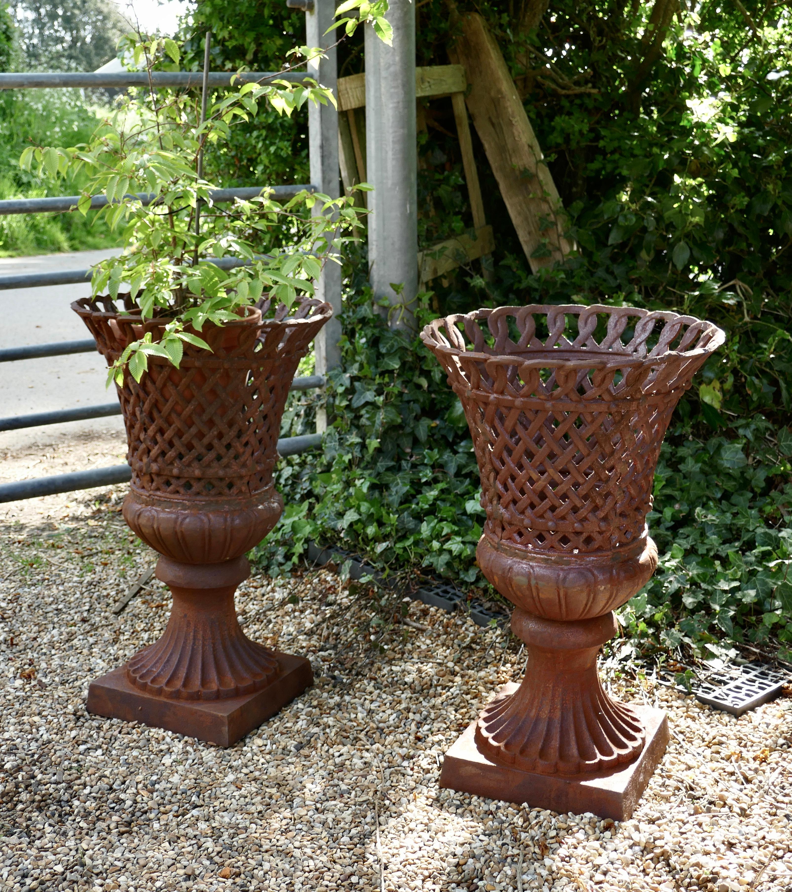 20th Century Unusual Pair of Lattice Work Cast Iron Garden Urns
