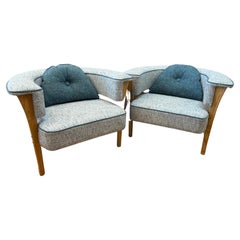 Unusual Pair of Mid Century Style Modern Arm Chairs