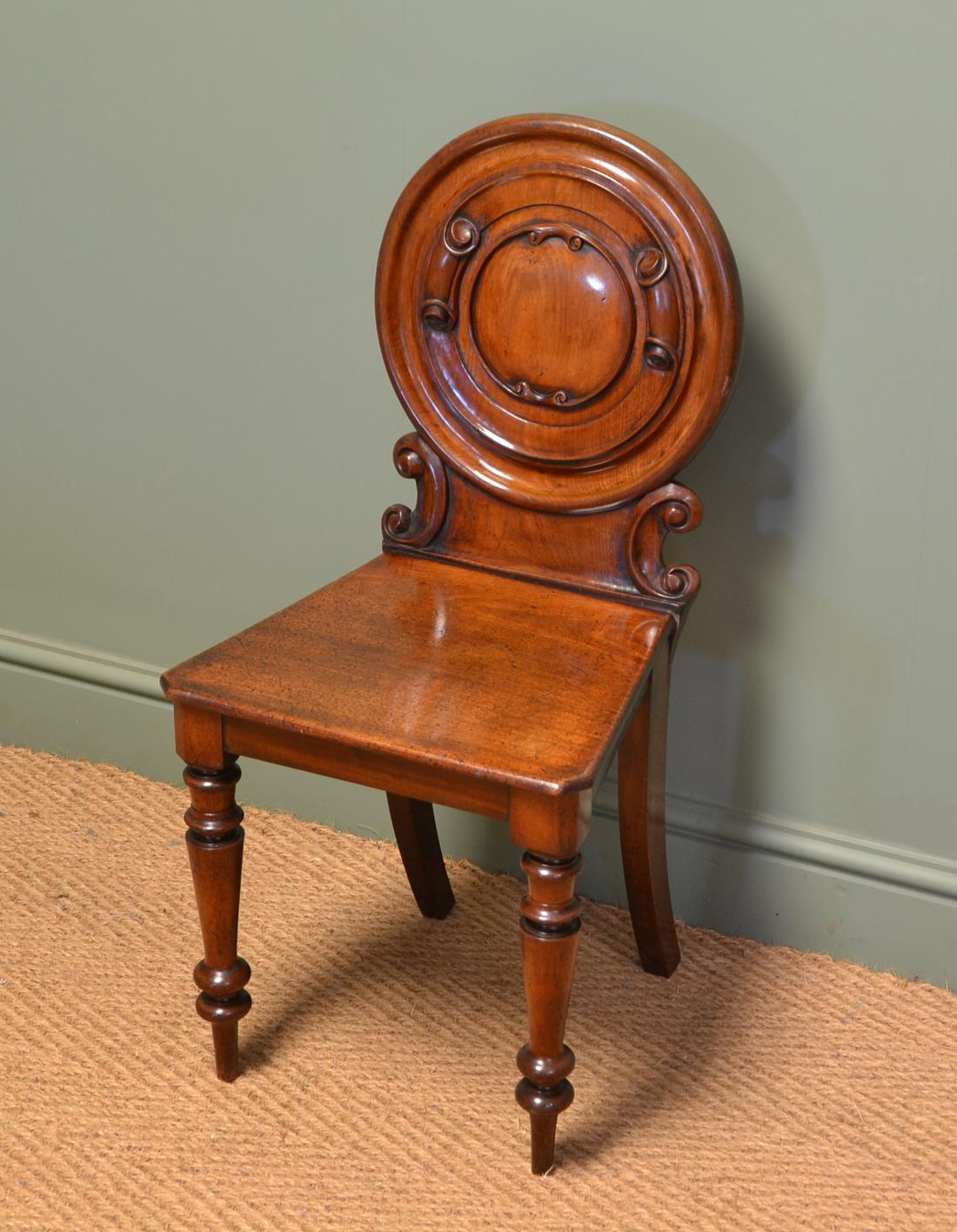 Unusual Pair Of Moulded Back Antique Mahogany Hall Chairs In Good Condition For Sale In Link 59 Business Park, Clitheroe