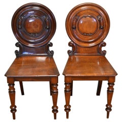 Unusual Pair Of Moulded Back Antique Mahogany Hall Chairs
