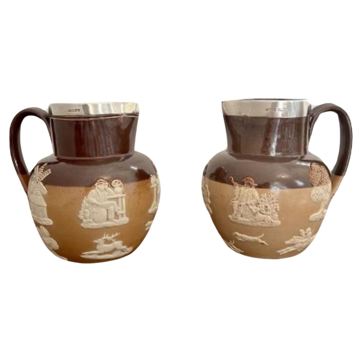 Unusual pair of quality antique Doulton Lambeth harvest jugs with silver rims  For Sale