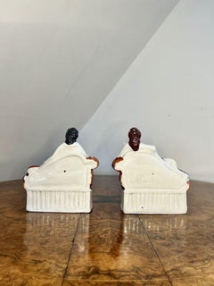 Unusual pair of quality antique Victorian Staffordshire bookends