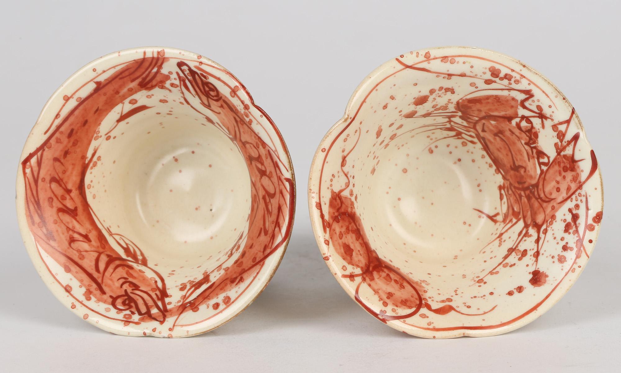 Modern Unusual Pair Pedestal Studio Pottery Cups Painted with Fish and Crab For Sale