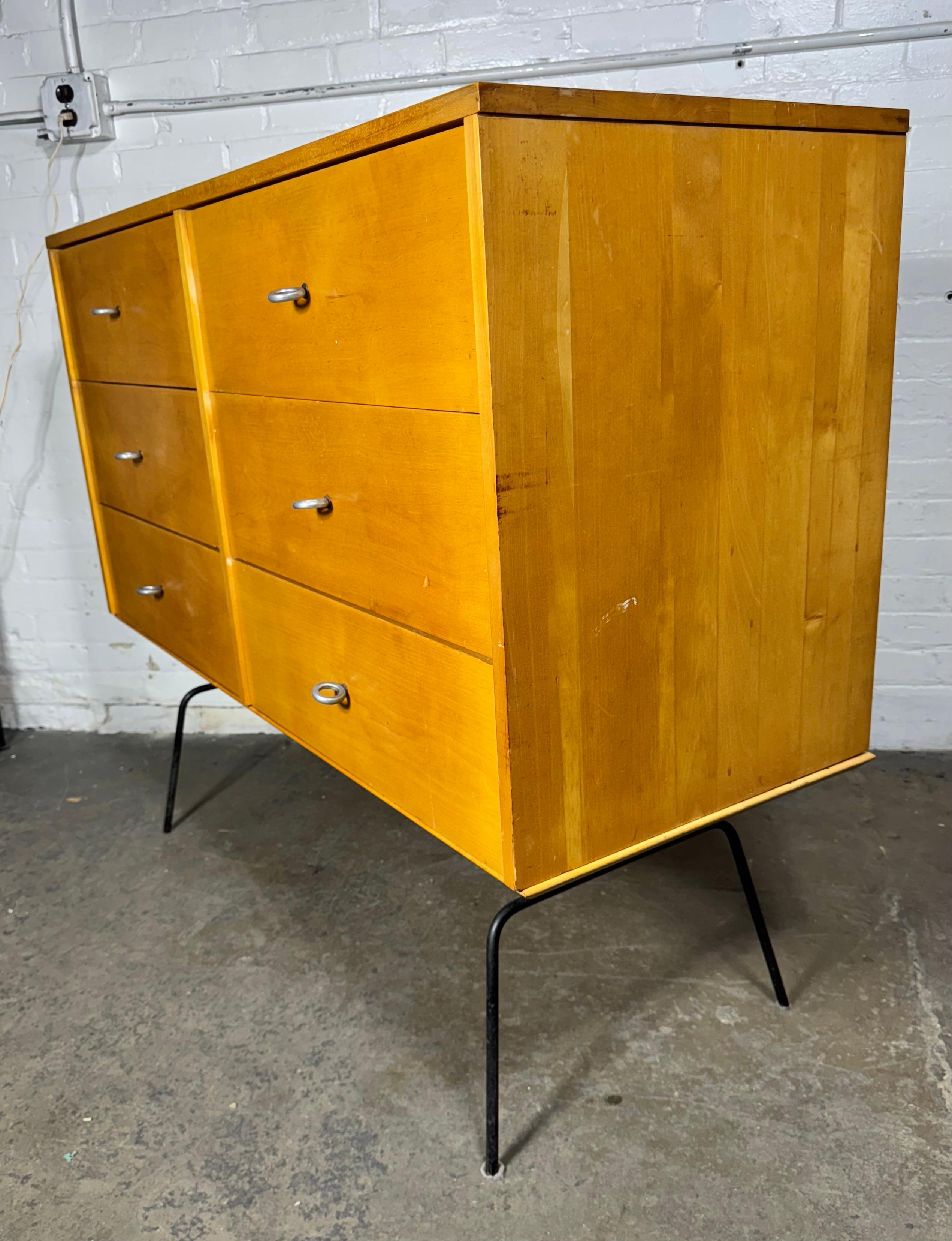 Unusual Paul McCobb 6-drawer dresser on rare iron base, aluminum ring pulls..solid maple.40 years in the business , I have owned several Paul McCobb pieces ,I have never seen or owned this rare example on this original iron base.Great design.