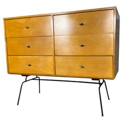 Unusual Paul McCobb 6-drawer dresser on iron base, aluminum ring pulls