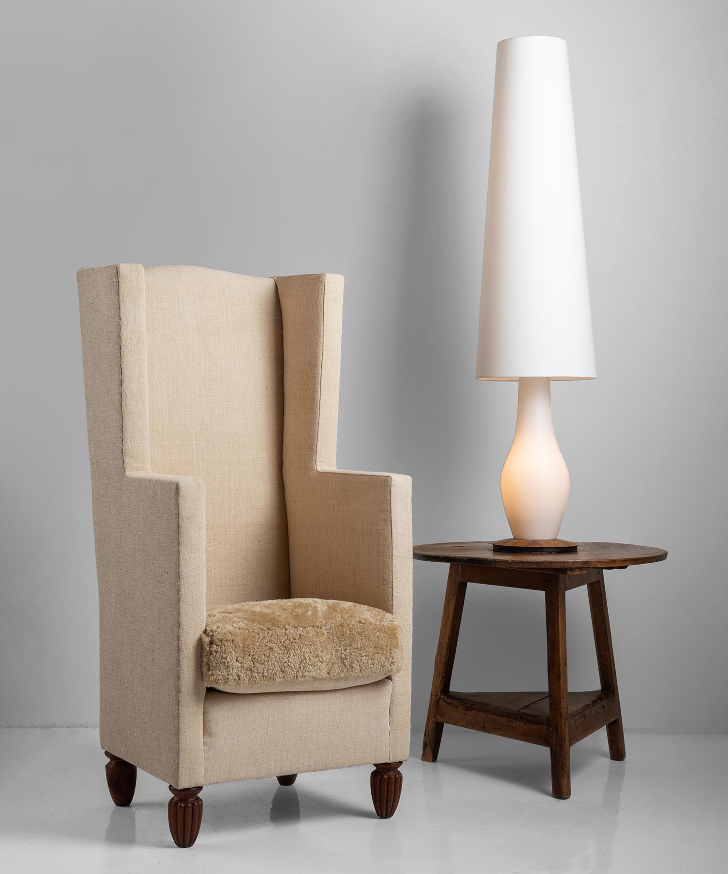 Unique form, newly upholstered in linen with shearling seat.
 