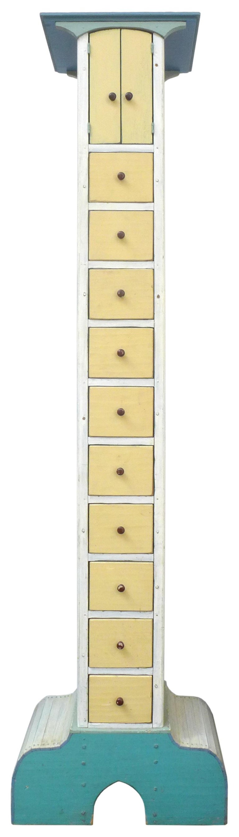 An unusual, Post-Modern chest of drawers by New England artisan Stephen Whittlesey. Wonderfully graphic scale and form, playfully executed with a multi-colored pastel paint finish. Whimsical yet utilitarian with its many drawers housed within an
