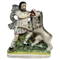 Figura antigua victoriana de calidad inusual de Sansón y el león de Staffordshire