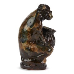 Unusual Quality Glazed Art Pottery Monkey Holding a Vase, 20th Century