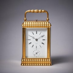 Unusual Ribbed Eight-Day Repeating Striking Gilt-Brass Gorge Case Carriage Clock