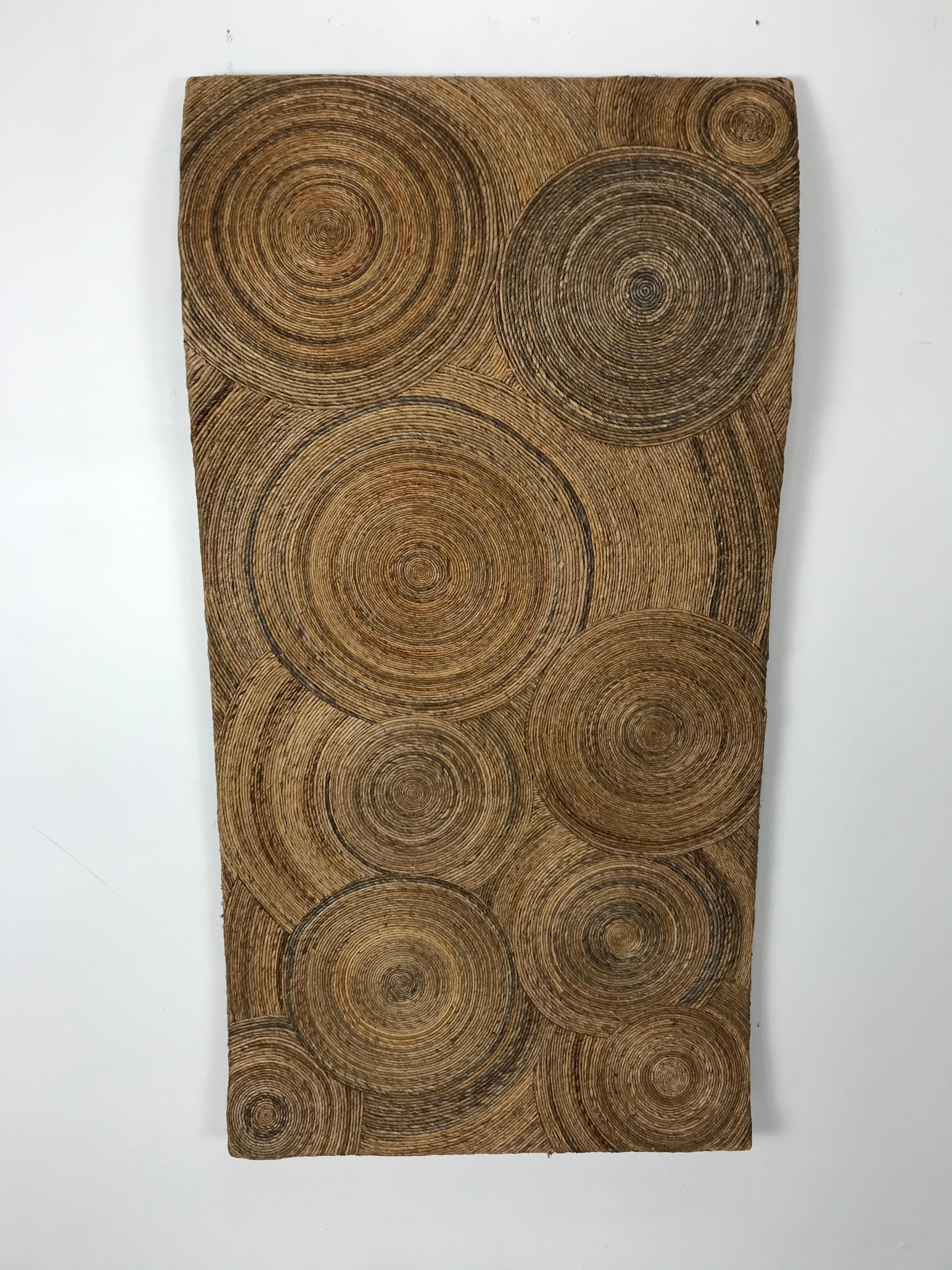 Unusual rope, paper cord. Jute 'CROP cIRCLE' and wave wall sculpture. Artist unknown, amazing quality and construction, wonderful coloration, patina. Can be hung vertically or horizontally.