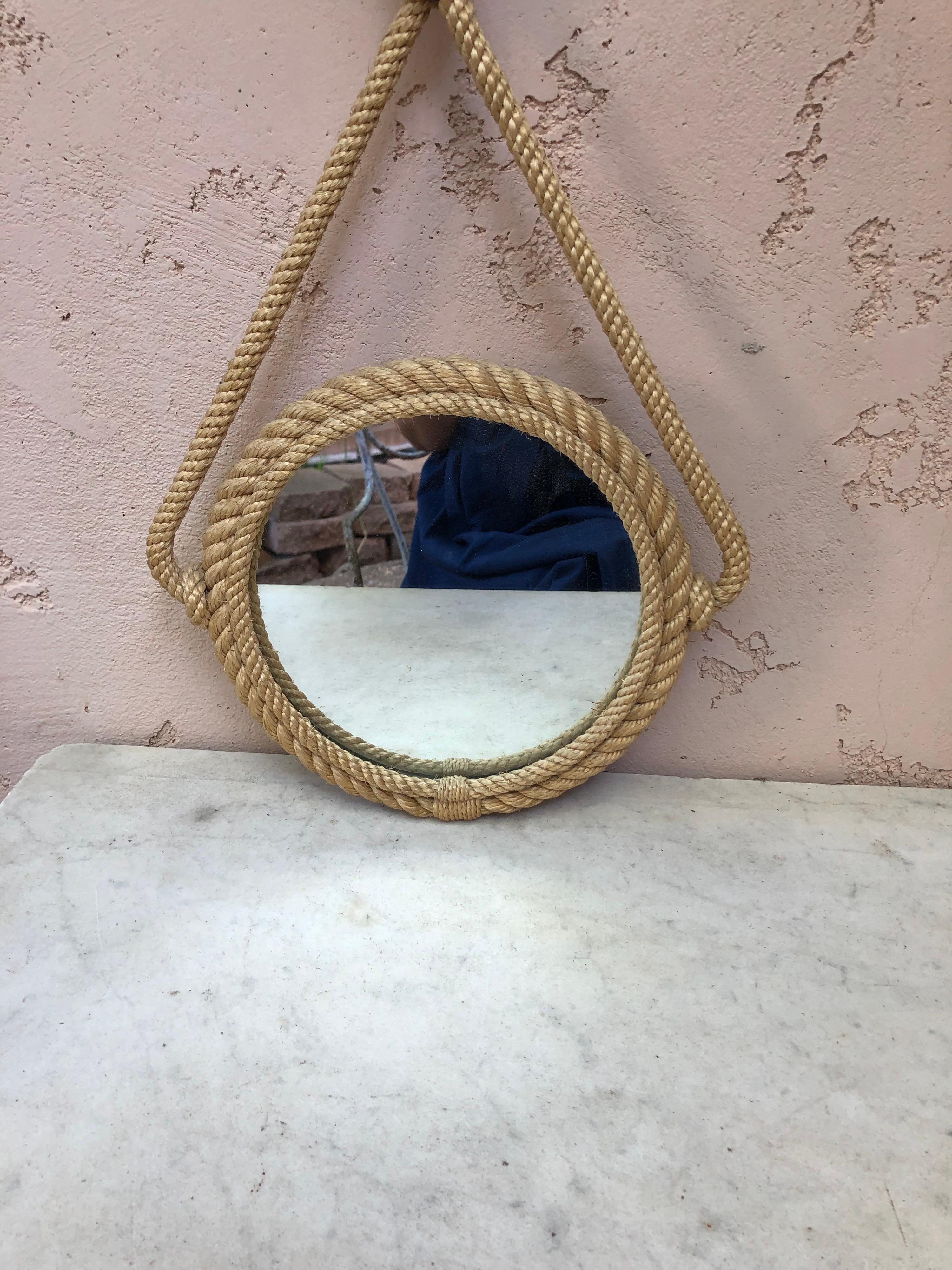 Unusual French round rope mirror Audoux Minet, circa 1960.
Measures: width / 11.5 inches.
height / 21 inches.

 