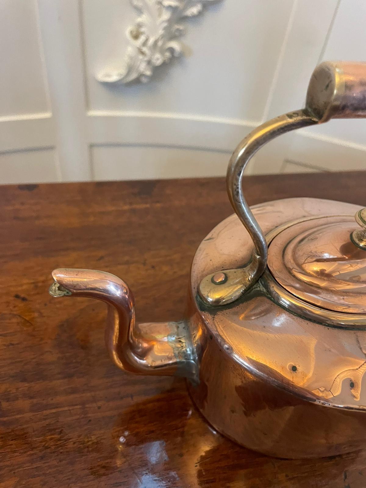 Unusual small Antique George III quality oval shaped copper kettle having an unusual small Antique George III oval shaped copper kettle with a shaped handle and spout with lift off lid 


A quaint example of desirable proportions.


We stock a large