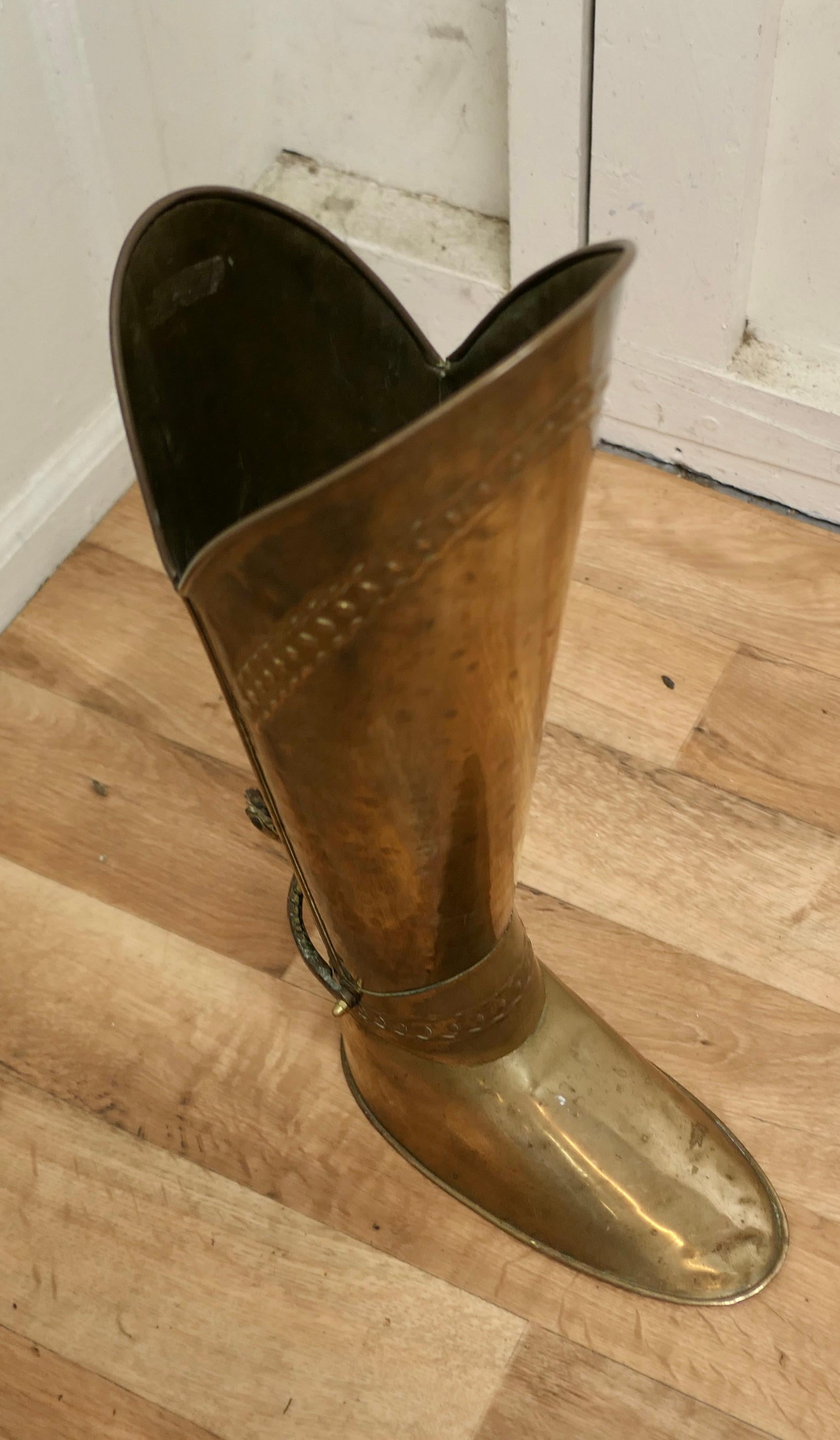 Unusual stick stand in the form of a brass boot.

This is a very unusual slightly quirky stick stand, the boot is all in brass and it even has spurs, it is heavily weighted so that it is steady when in use.

The stand is in good used condition,