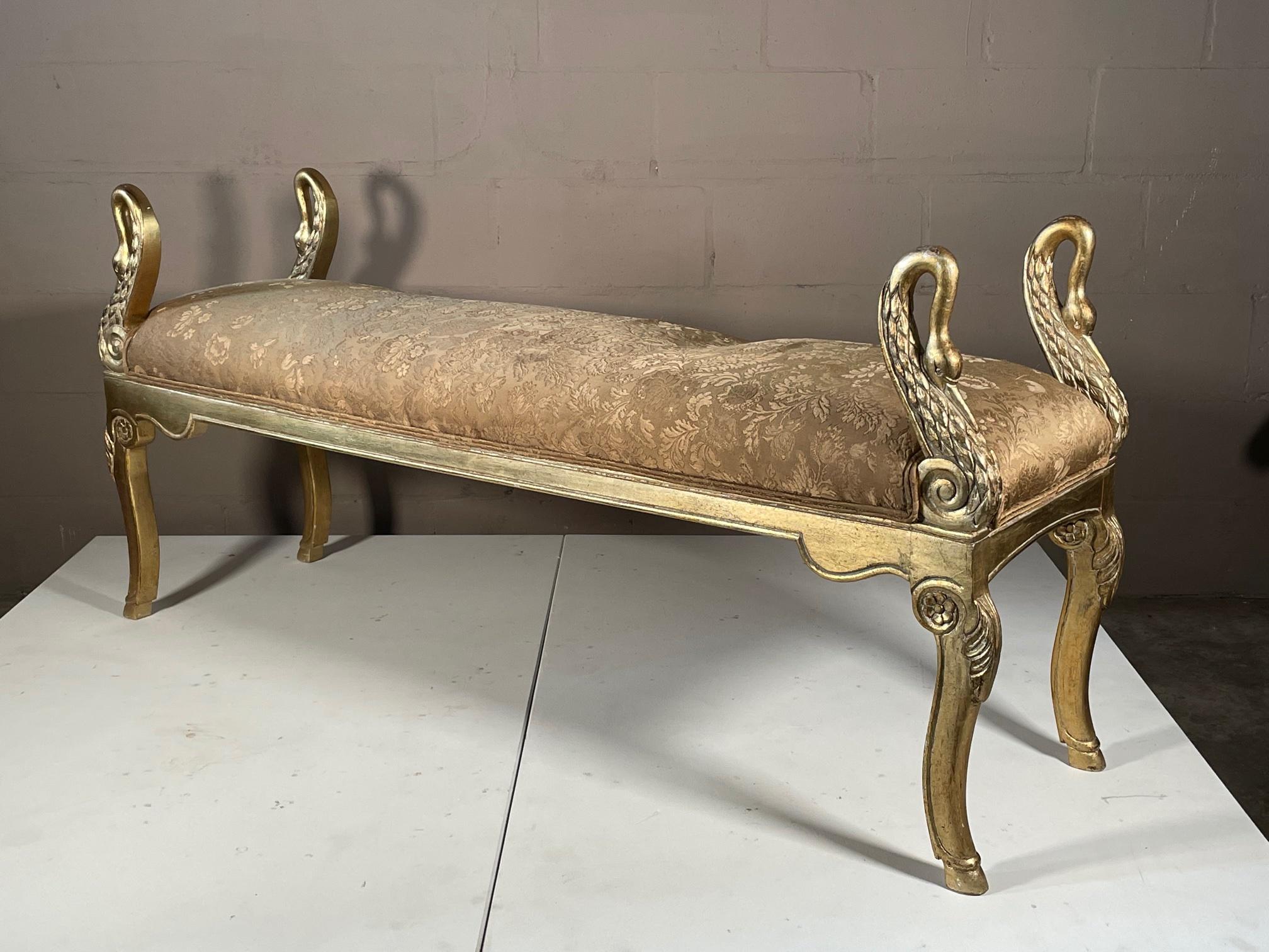 An unusual stylized swan, upholstered bench, gold leaf over carved wood, France, ca' 1950's.