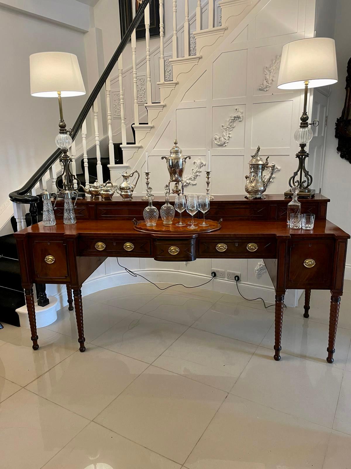 Unusual tall pair of attractive quality brass and glass lamps having a quality unusual round reeded glass ball above a shaped brass stand raised on a square stepped base with brass ball feet

H 90 x W 20 x D 20cm without shade (shade not