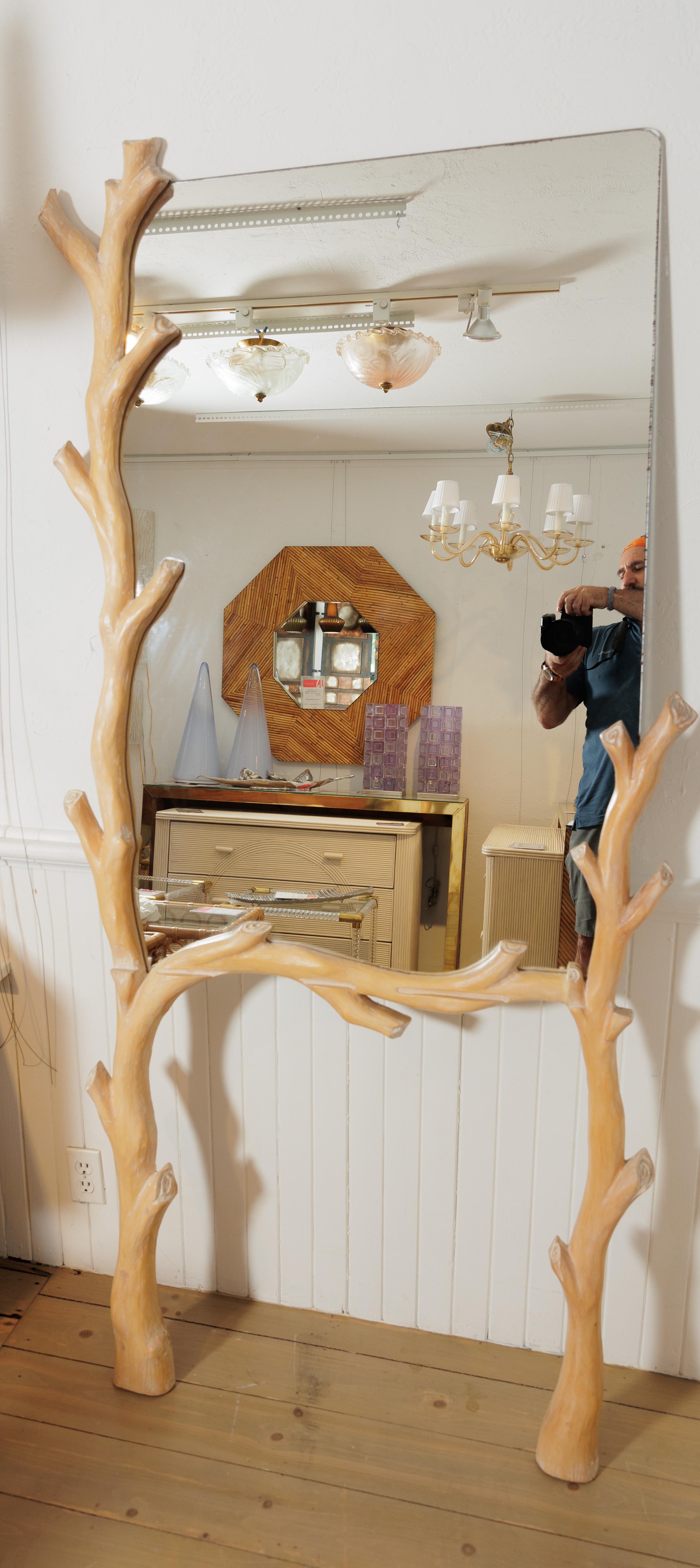 Unusual tree form surround standing mirror in a whitewash finish.
