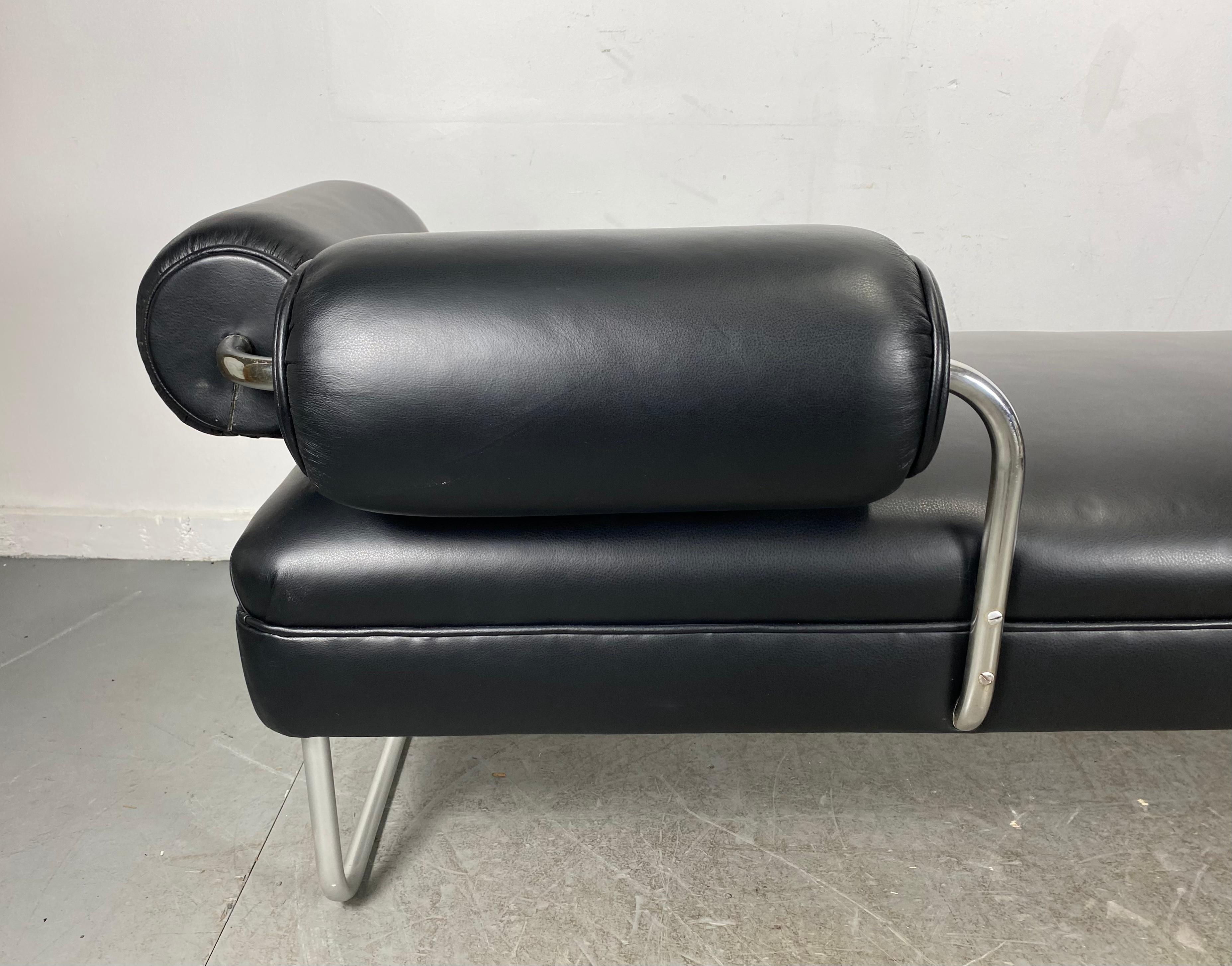 Most Unusual Tubular chrome and Leather Bauhaus chaise lounge / daybed, amazing design, two large attached Bolster Pillows (arm and back rest). Extremely comfortable, totally restored, wonderful soft black leather, Hand delivery avail to New York