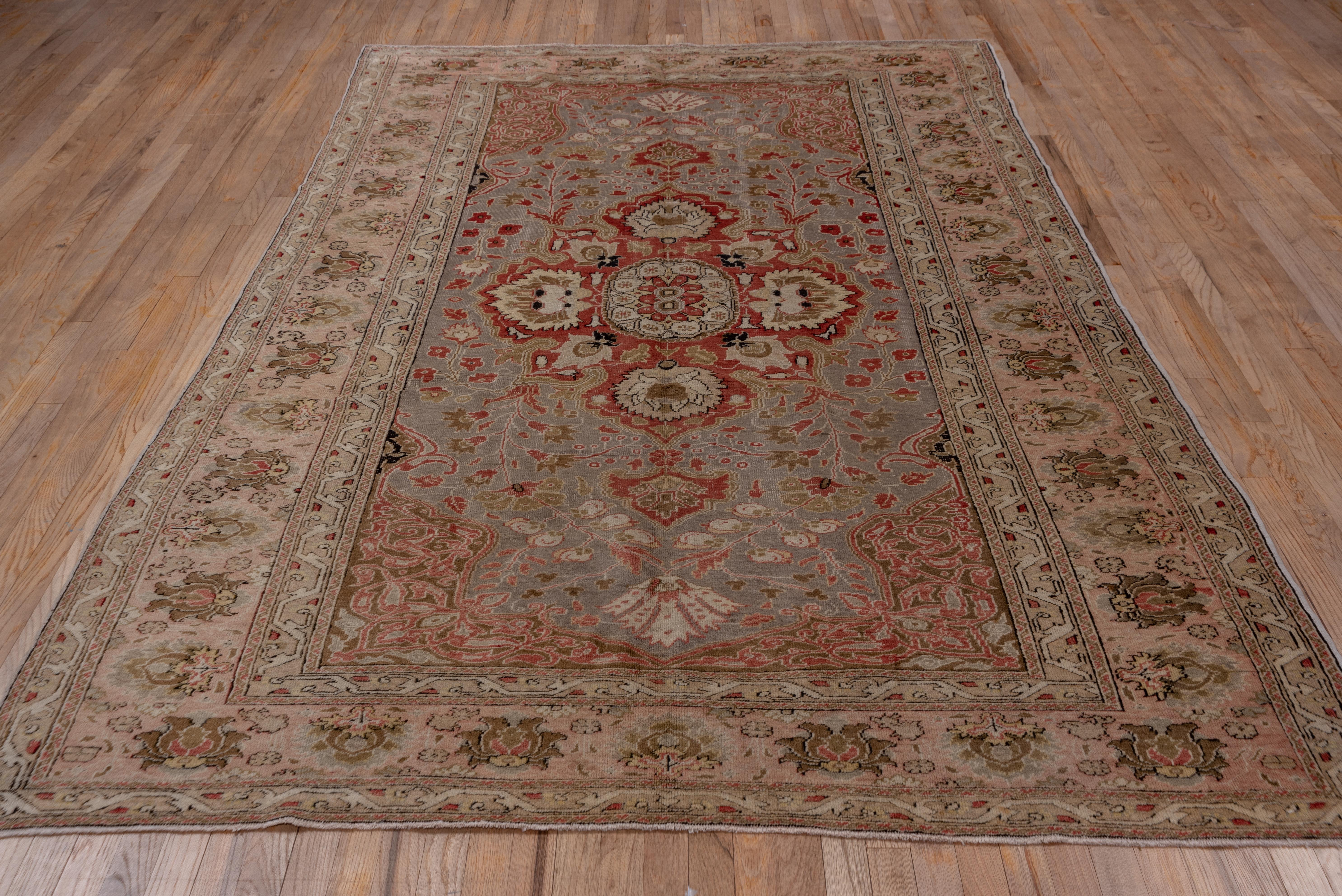 Hand-Knotted Unusual Turkish Oushak Rug, Gray Field, Pink Borders, Center Medallion For Sale